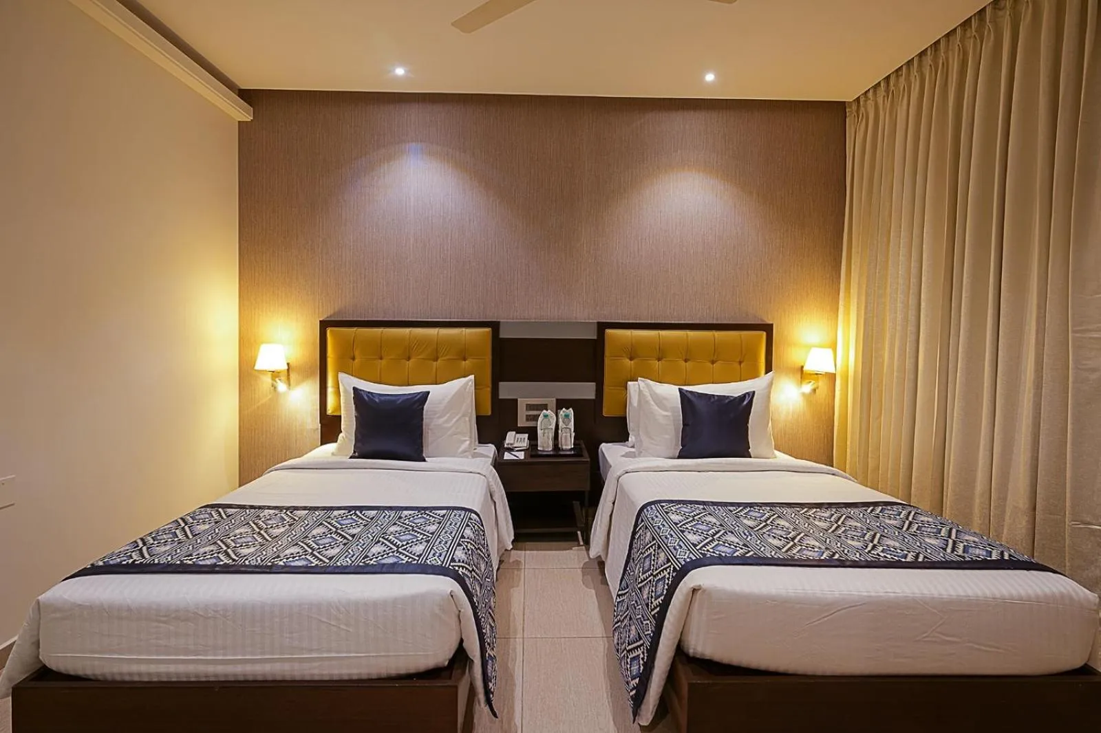 Bedroom, Bed in Grand Continent Malleshwaram A Sarovar Portico Affiliate Hotel