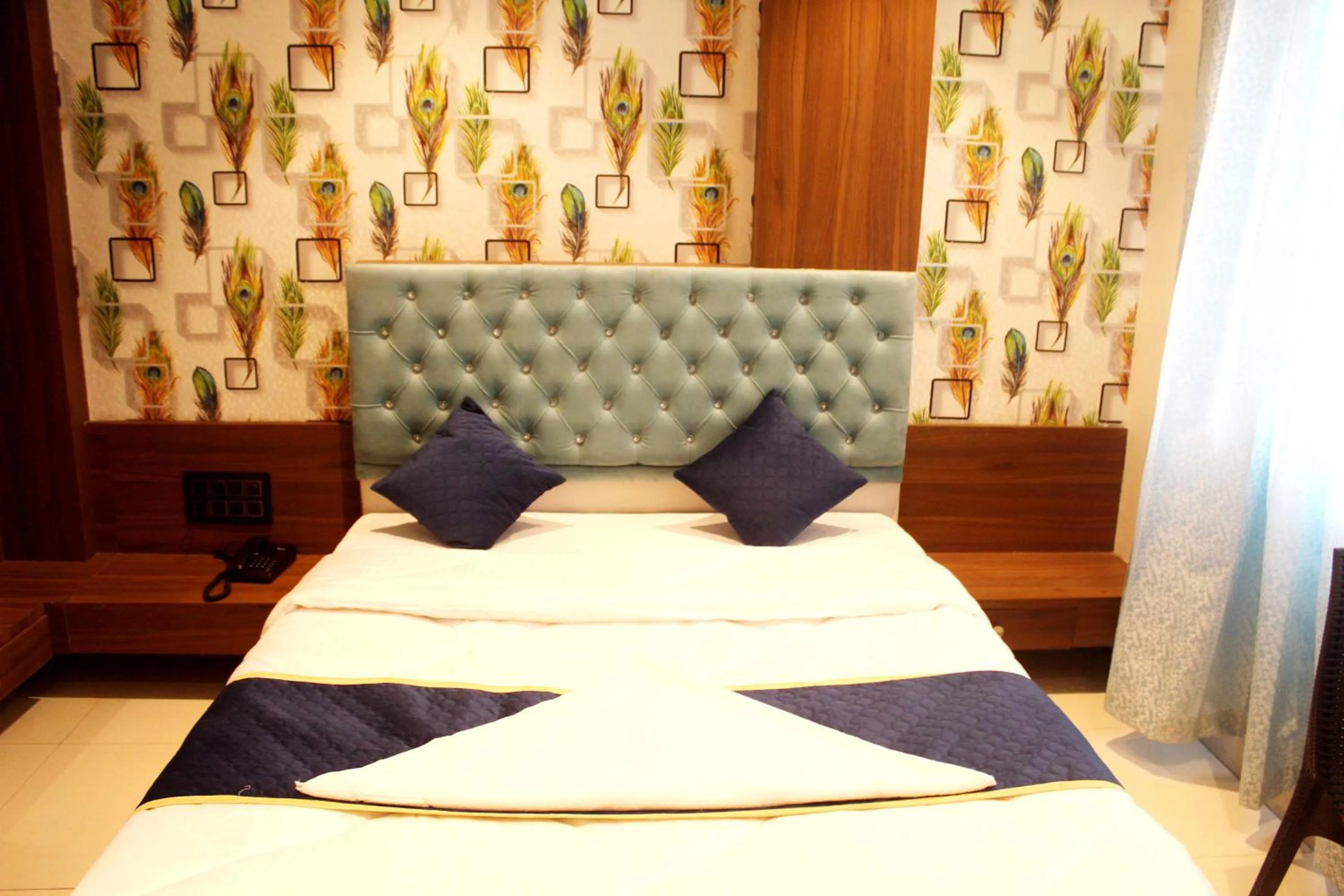Bed in Hotel India Gate Narhe, Pune