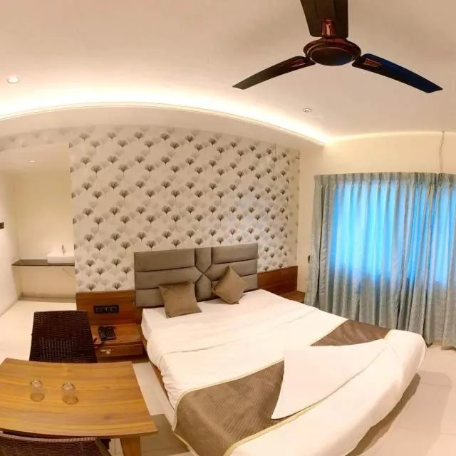 Photo of the whole room in Hotel India Gate Narhe, Pune