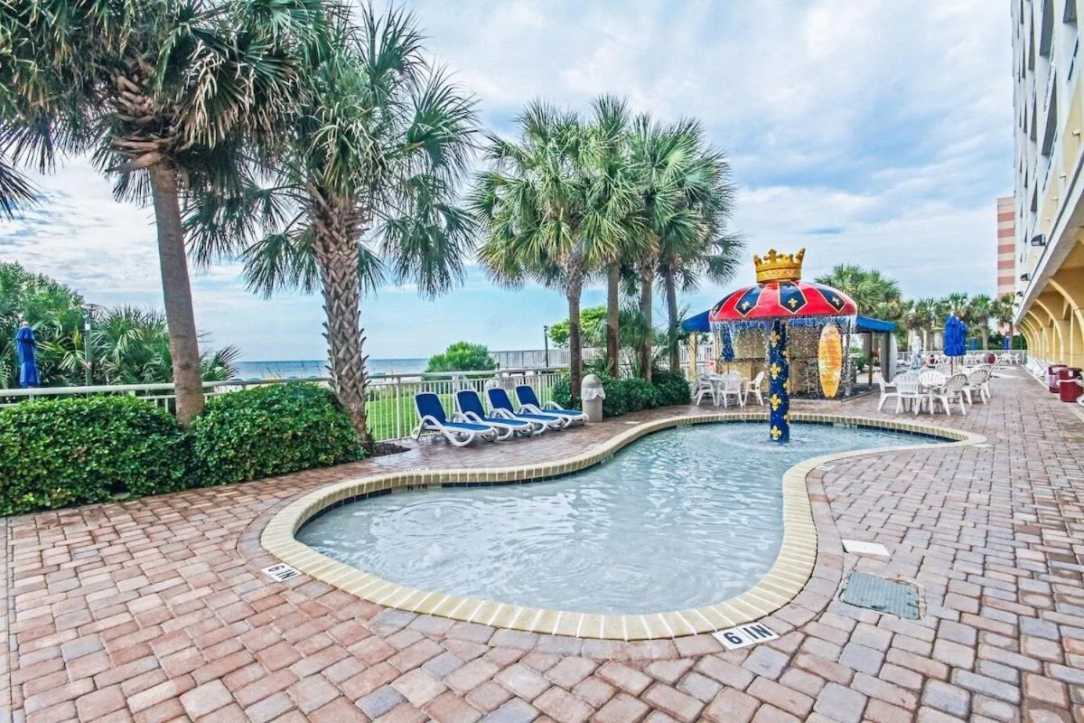 Pool view in Camelot By The Sea - Blue Palmetto Vacation Rentals