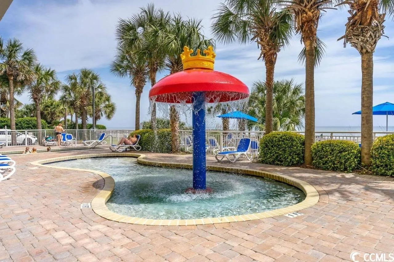 Pool view in Camelot By The Sea - Blue Palmetto Vacation Rentals