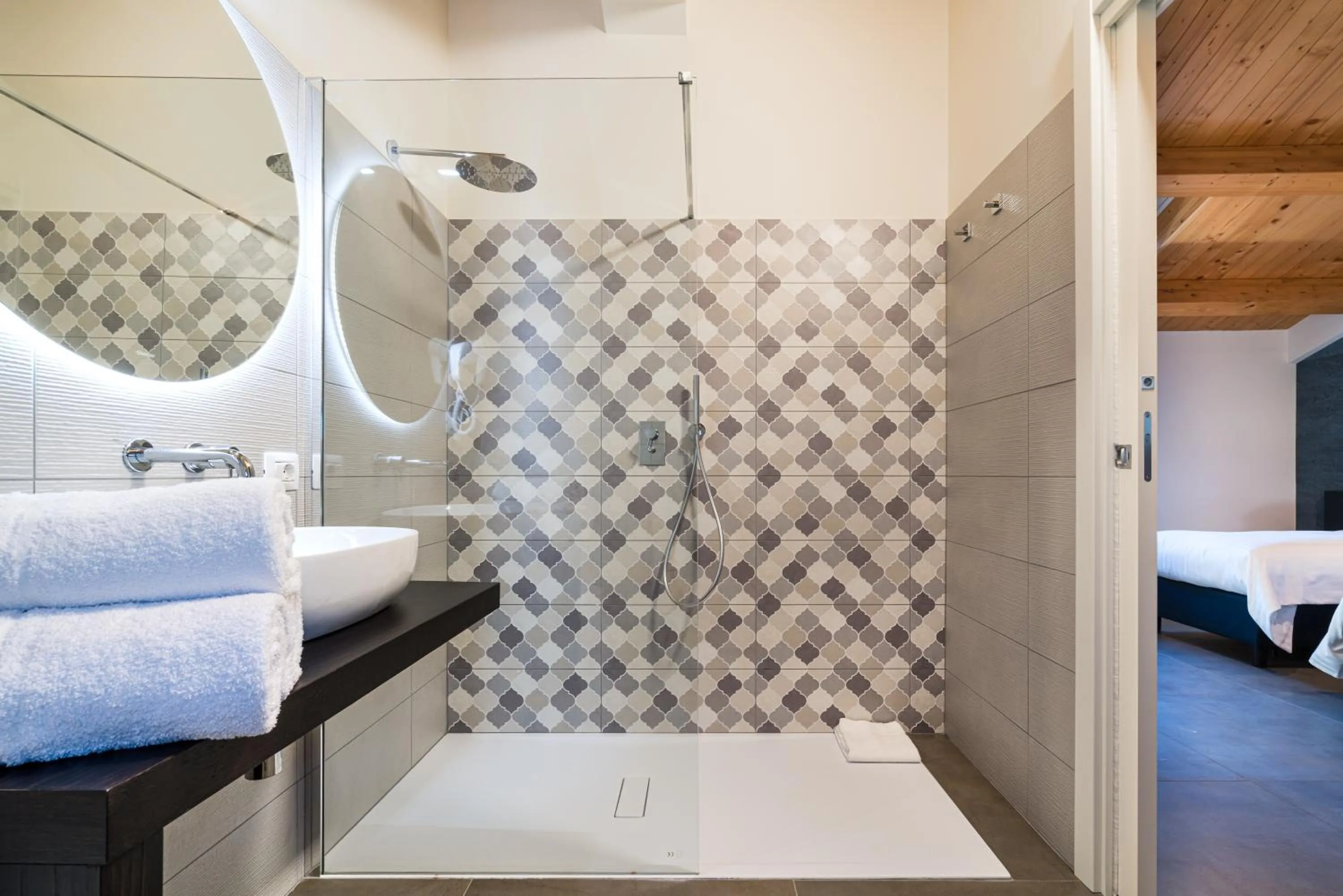 Bathroom, Bed in I Due Mori - Luxury Rooms