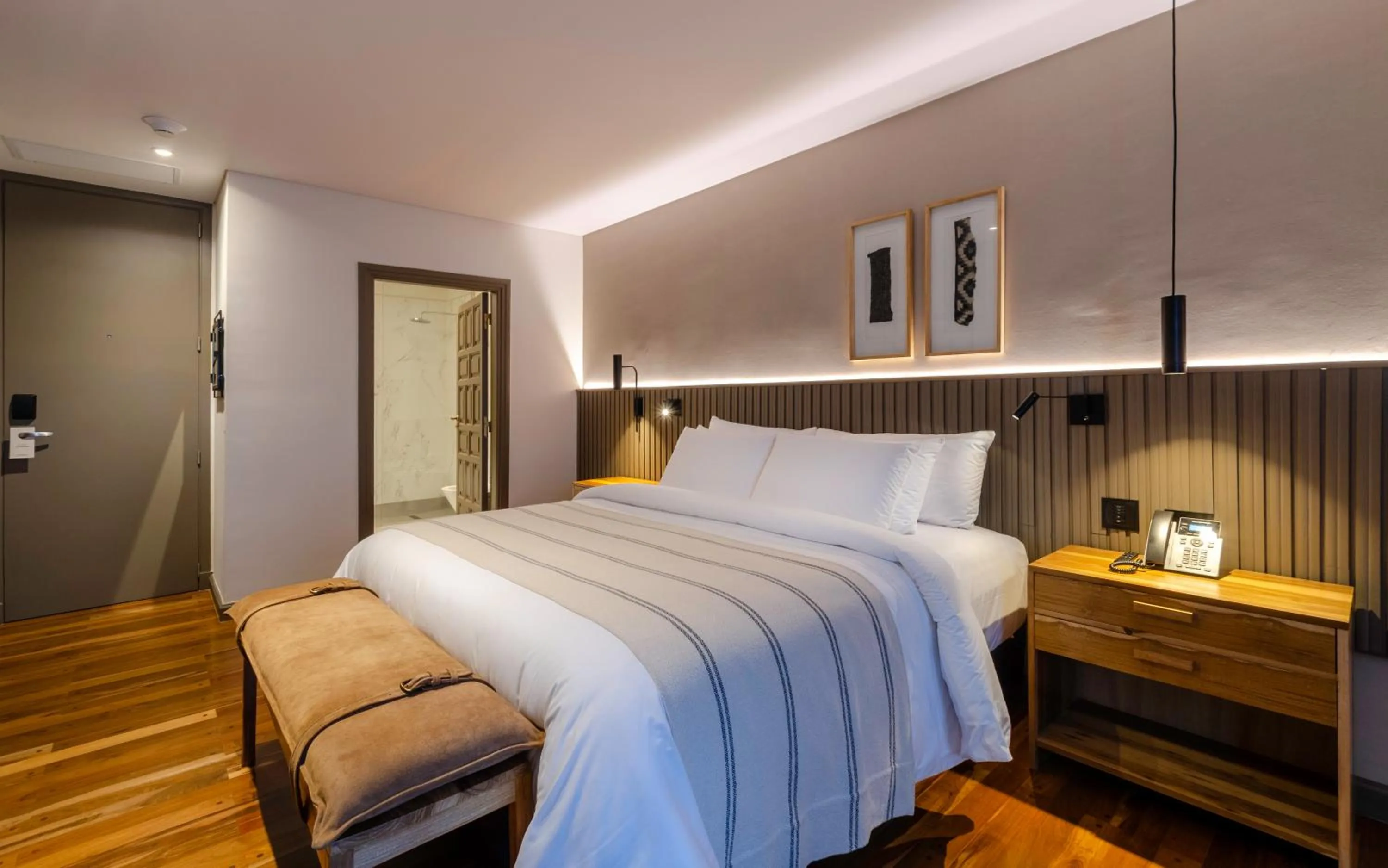 Bed in El Bodeguero Hotel