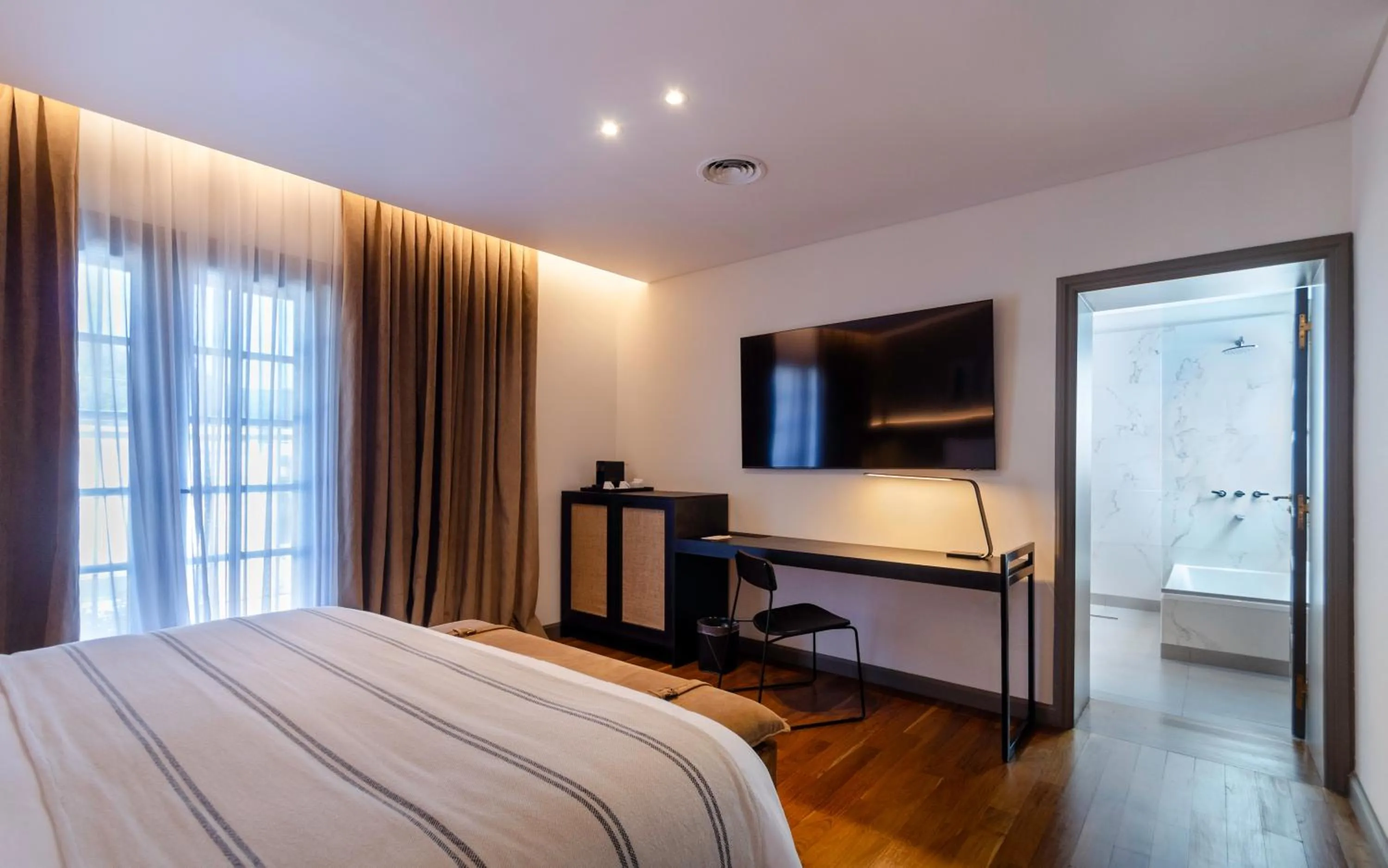 Bed in El Bodeguero Hotel