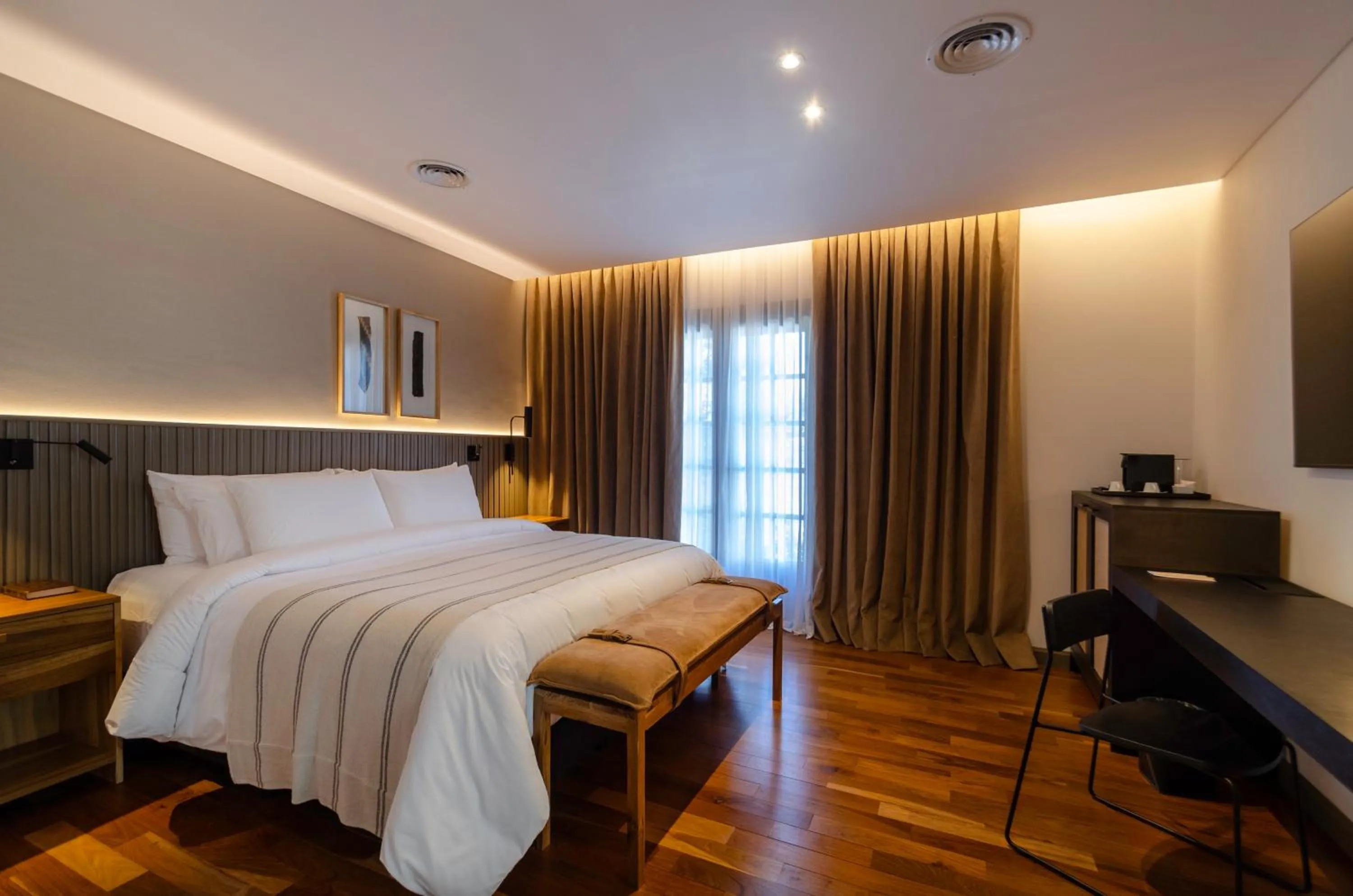 Bed in El Bodeguero Hotel