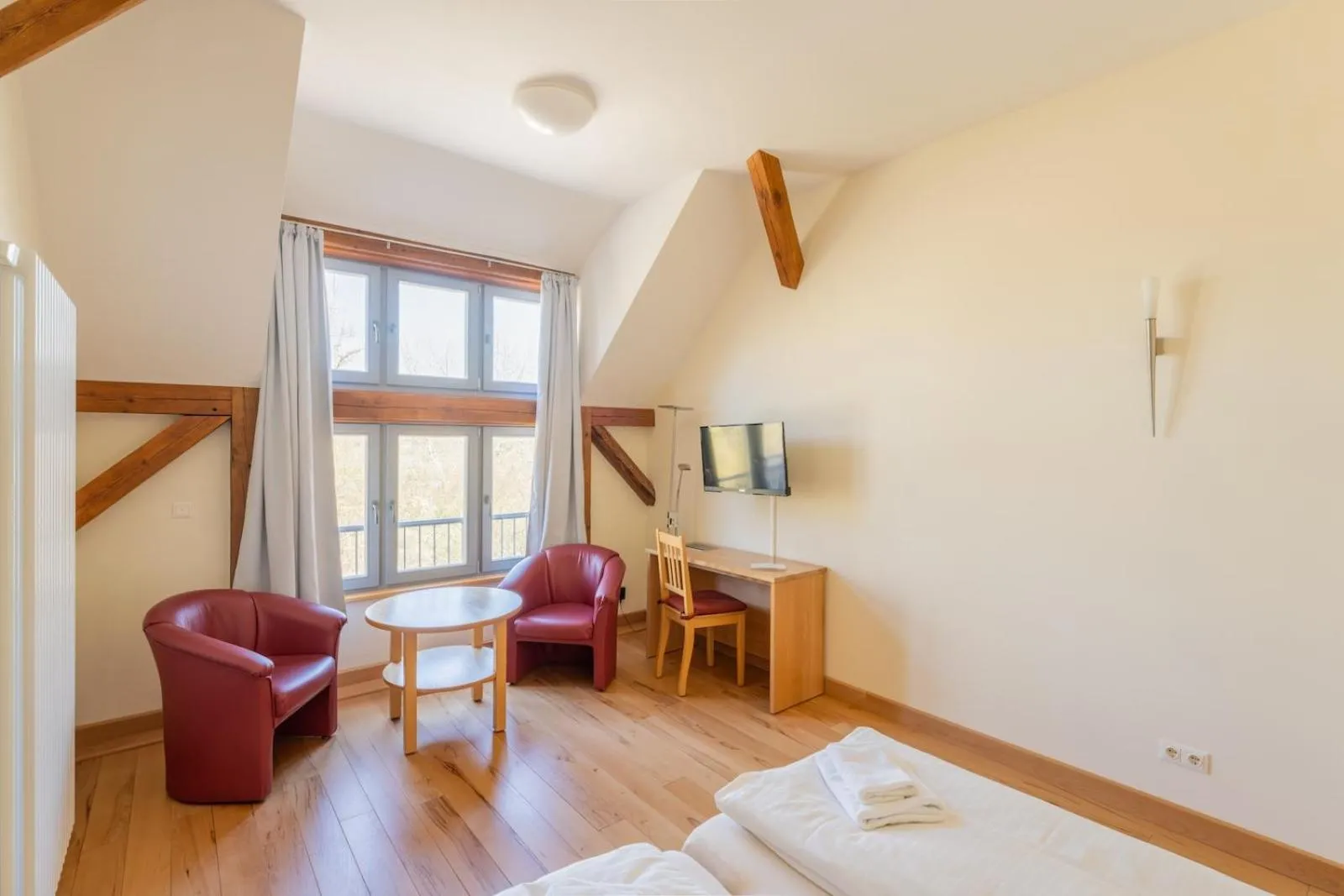 Photo of the whole room, Bed in Biohotel Stiftsgut Wilhelmsglücksbrunn