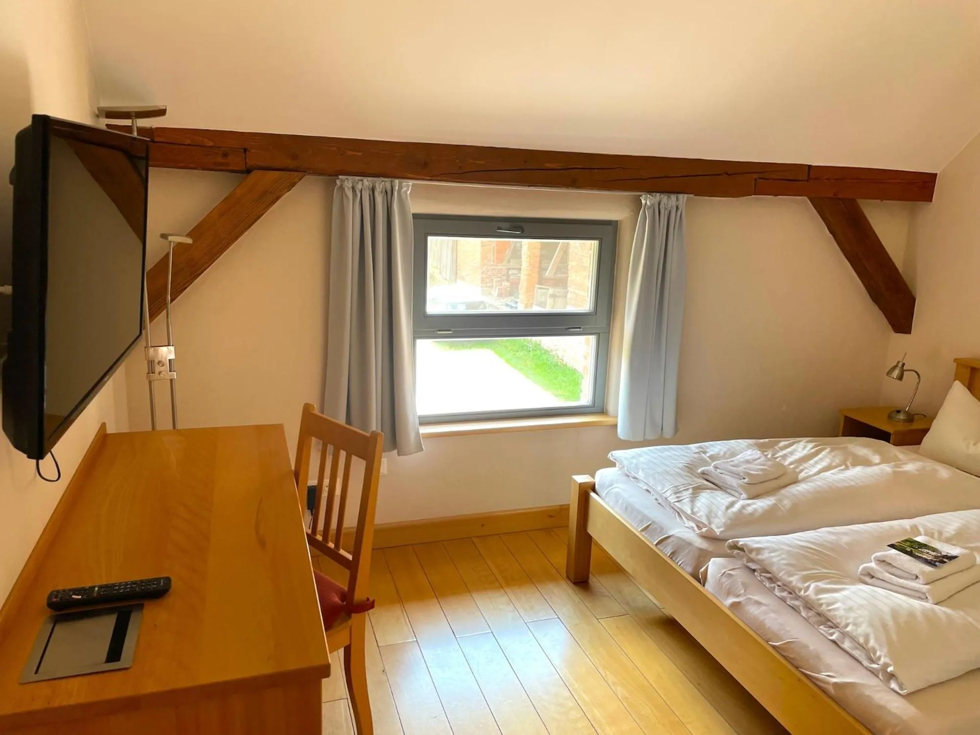 Photo of the whole room, Bed in Biohotel Stiftsgut Wilhelmsglücksbrunn