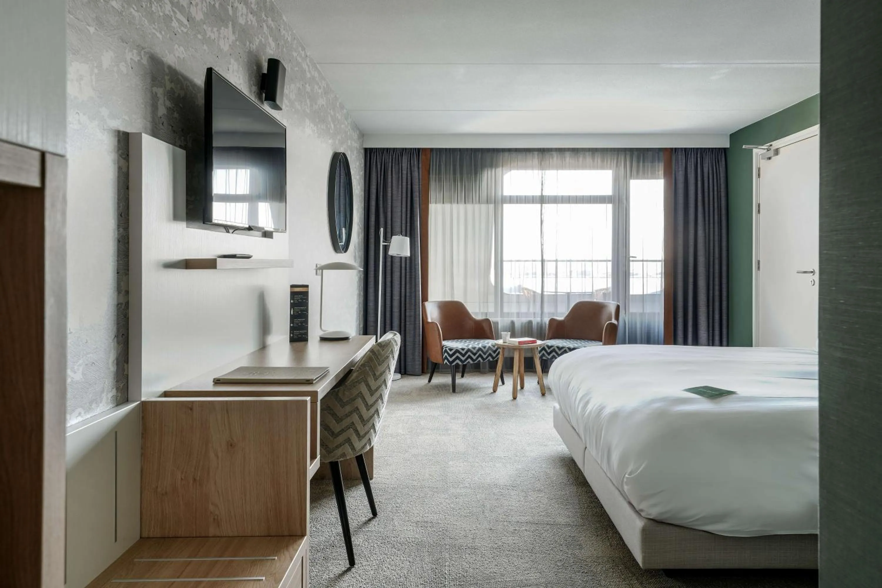 Living room, Bed in Paal 8 Hotel aan Zee