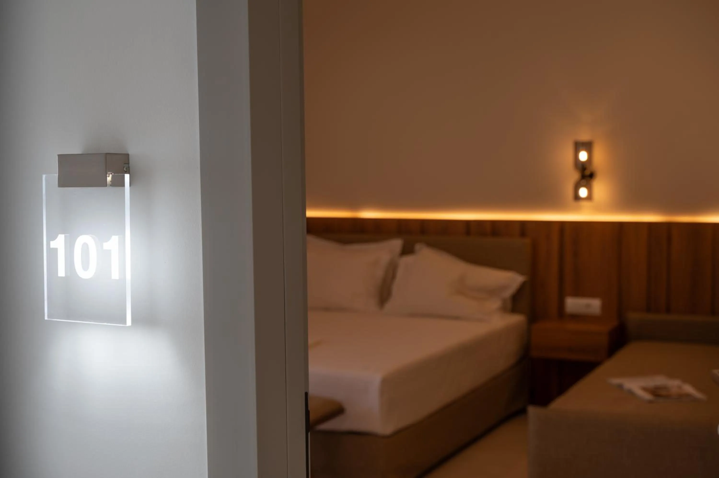 Bed in Sunrise SeaSide Suites