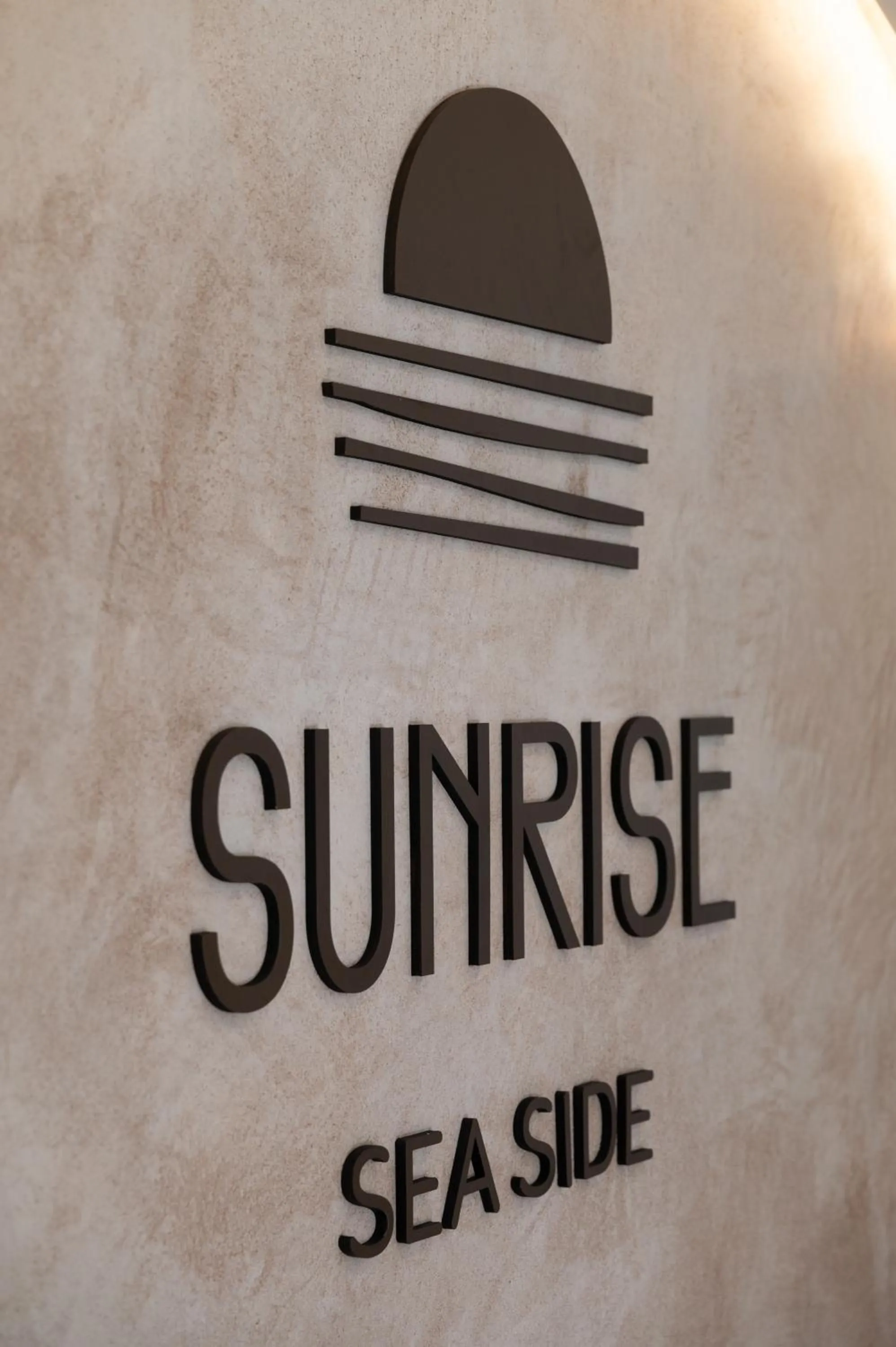 Property logo or sign in Sunrise SeaSide Suites