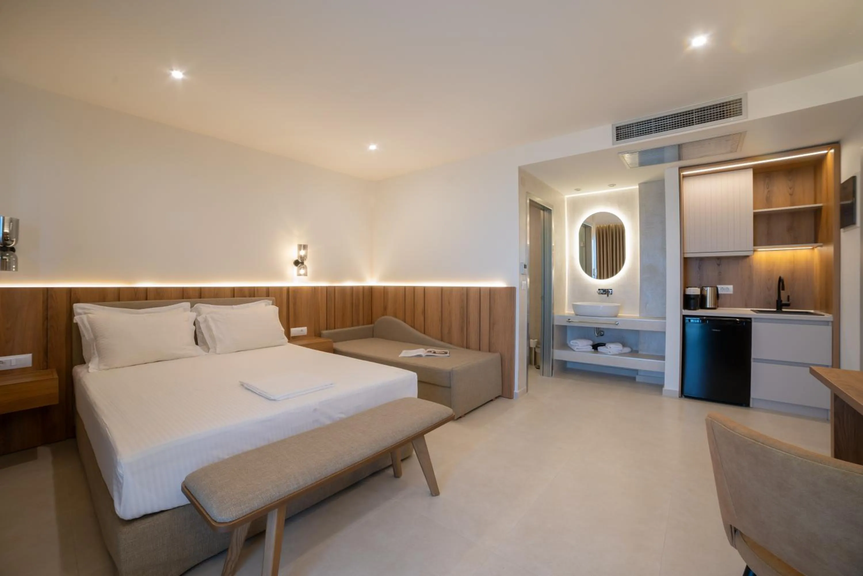 Bed in Sunrise SeaSide Suites