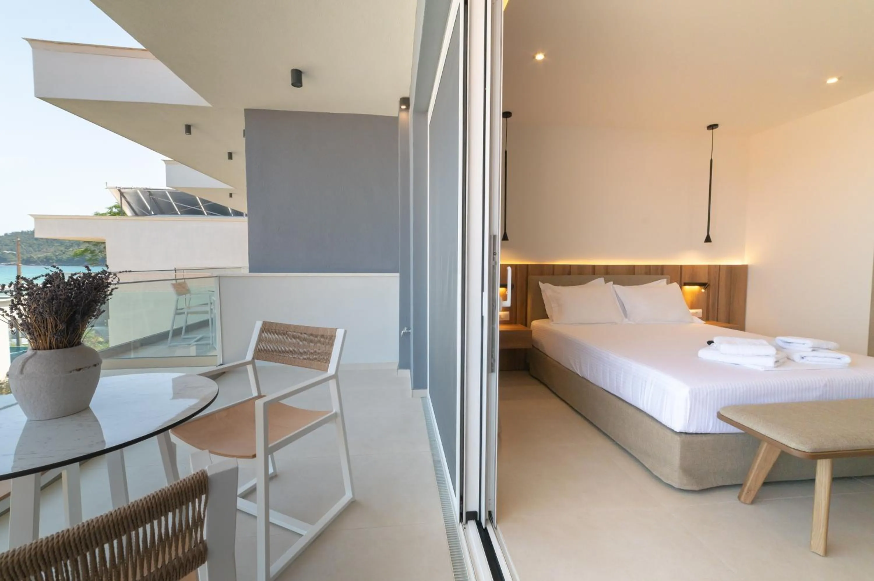 Bed in Sunrise SeaSide Suites