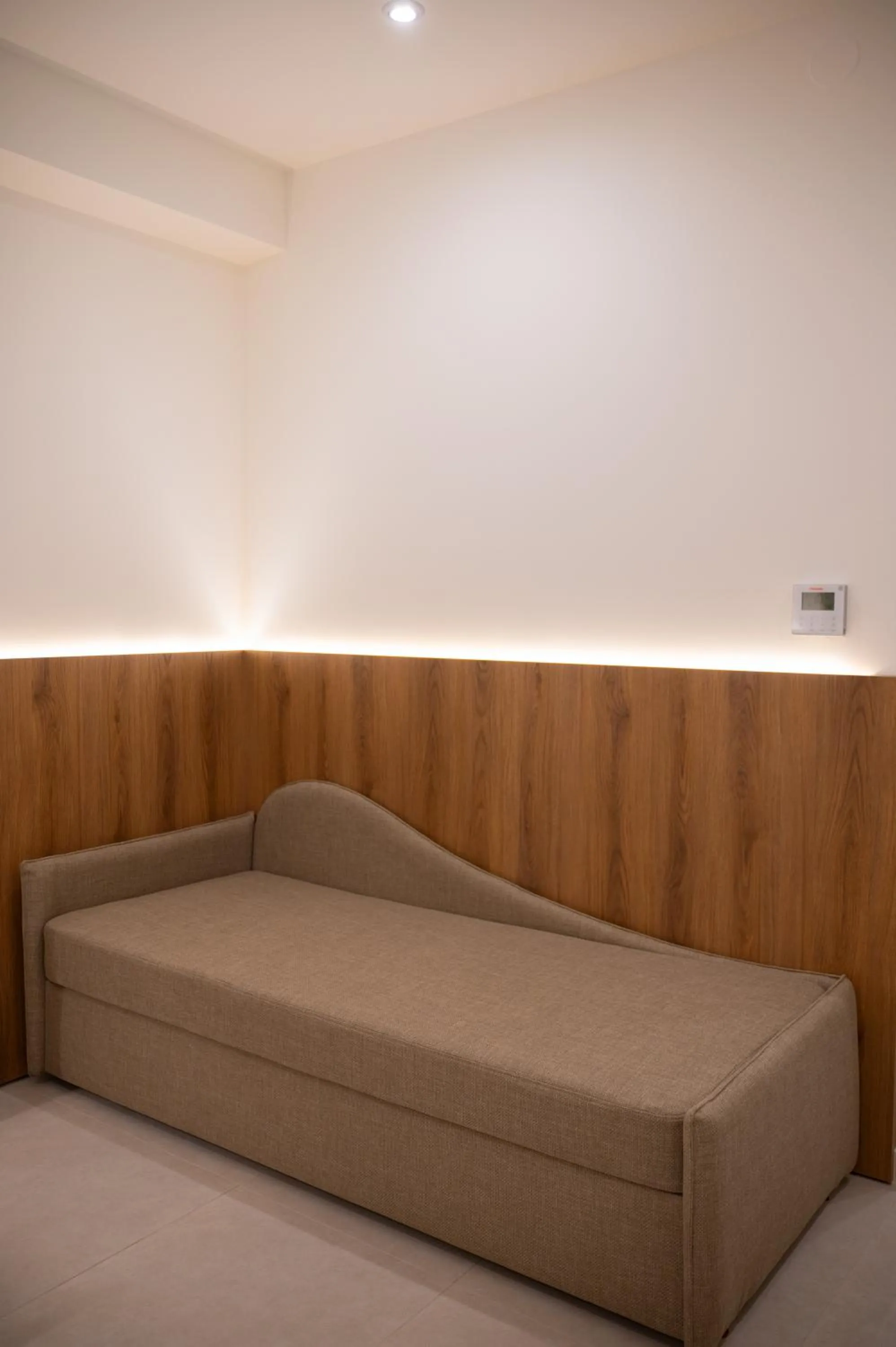 Bed in Sunrise SeaSide Suites