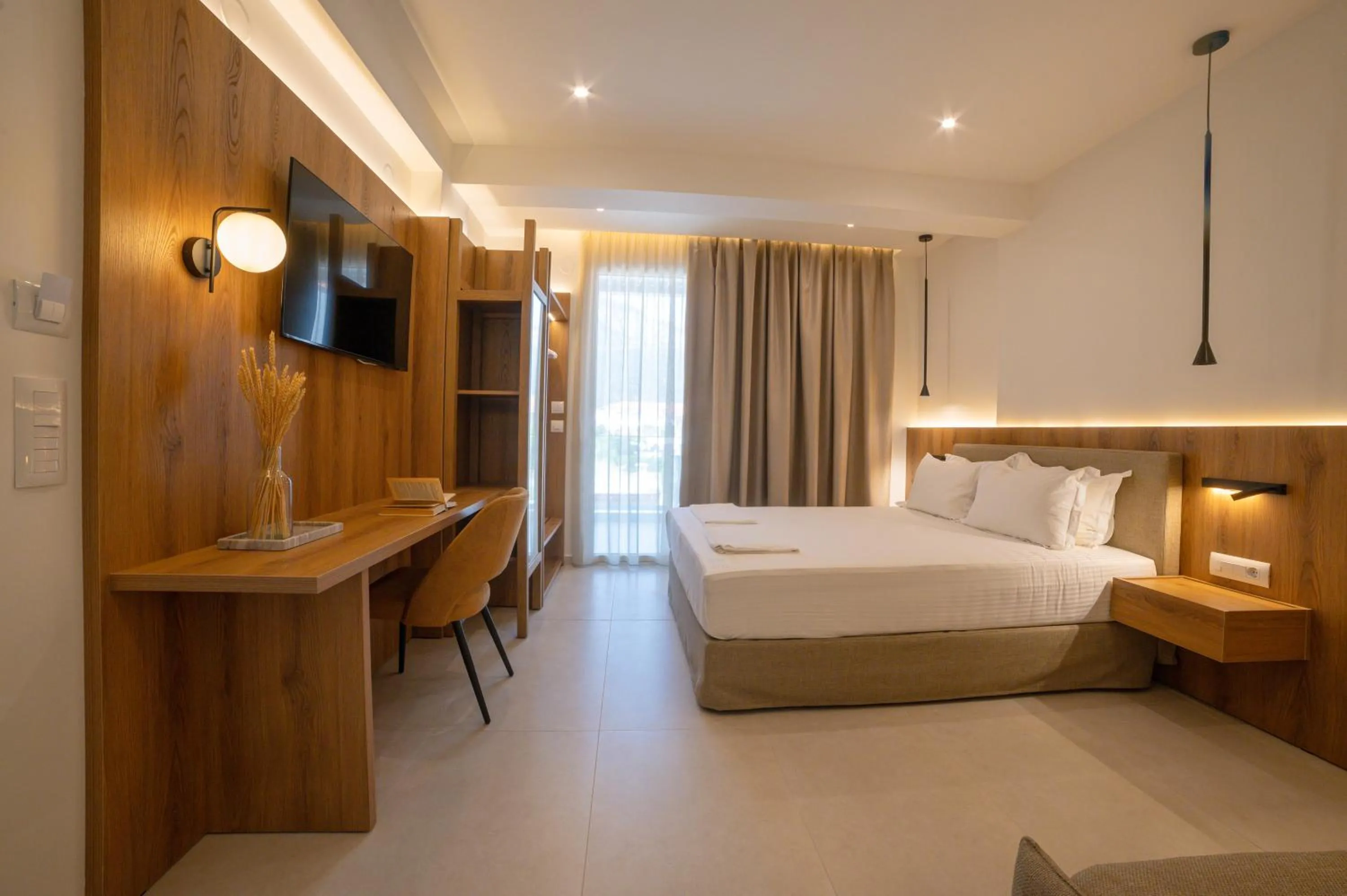Photo of the whole room, Bed in Sunrise SeaSide Suites
