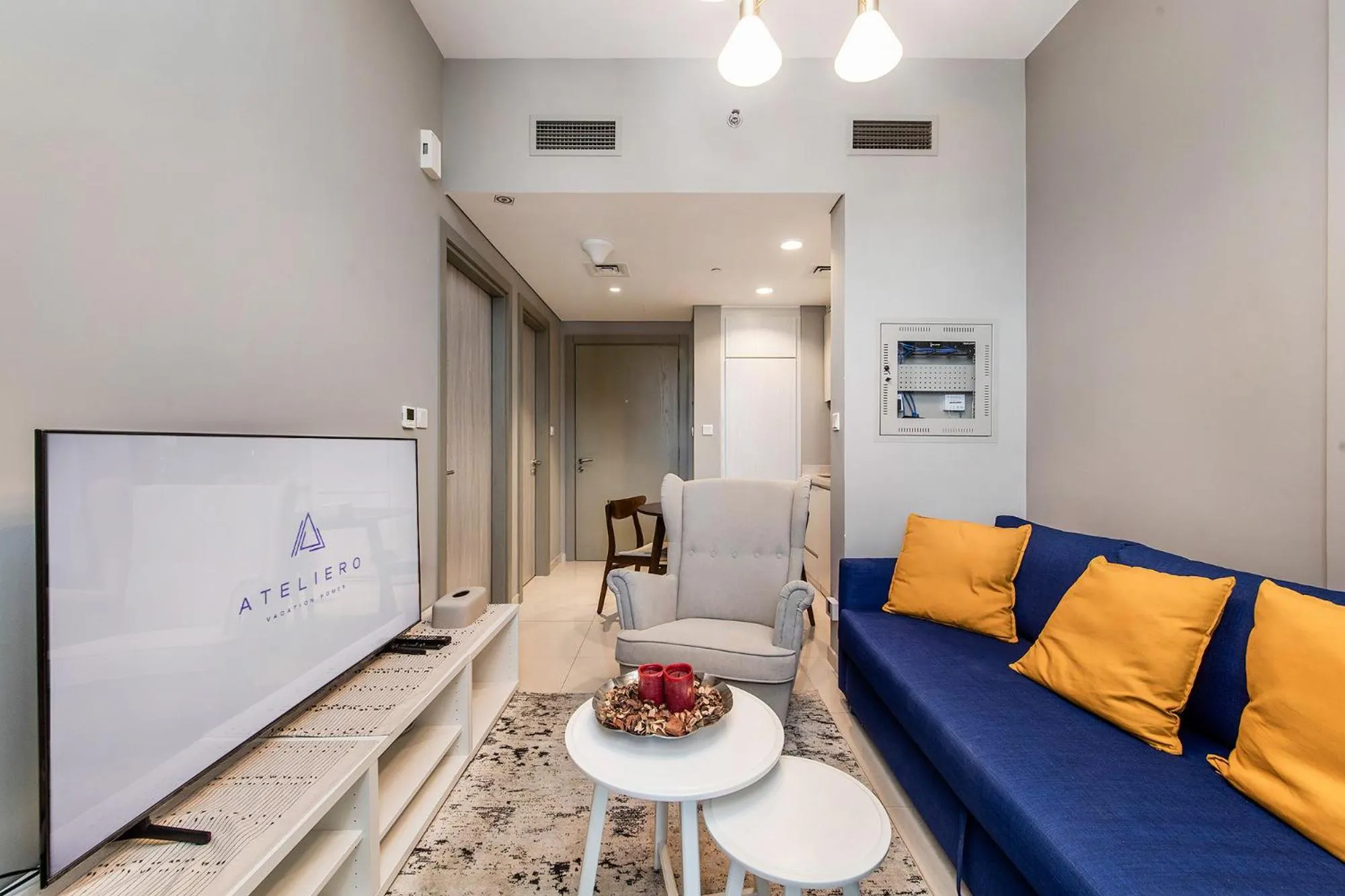 Living room in Zada Tower 1BR with amazing Dubai Canal view