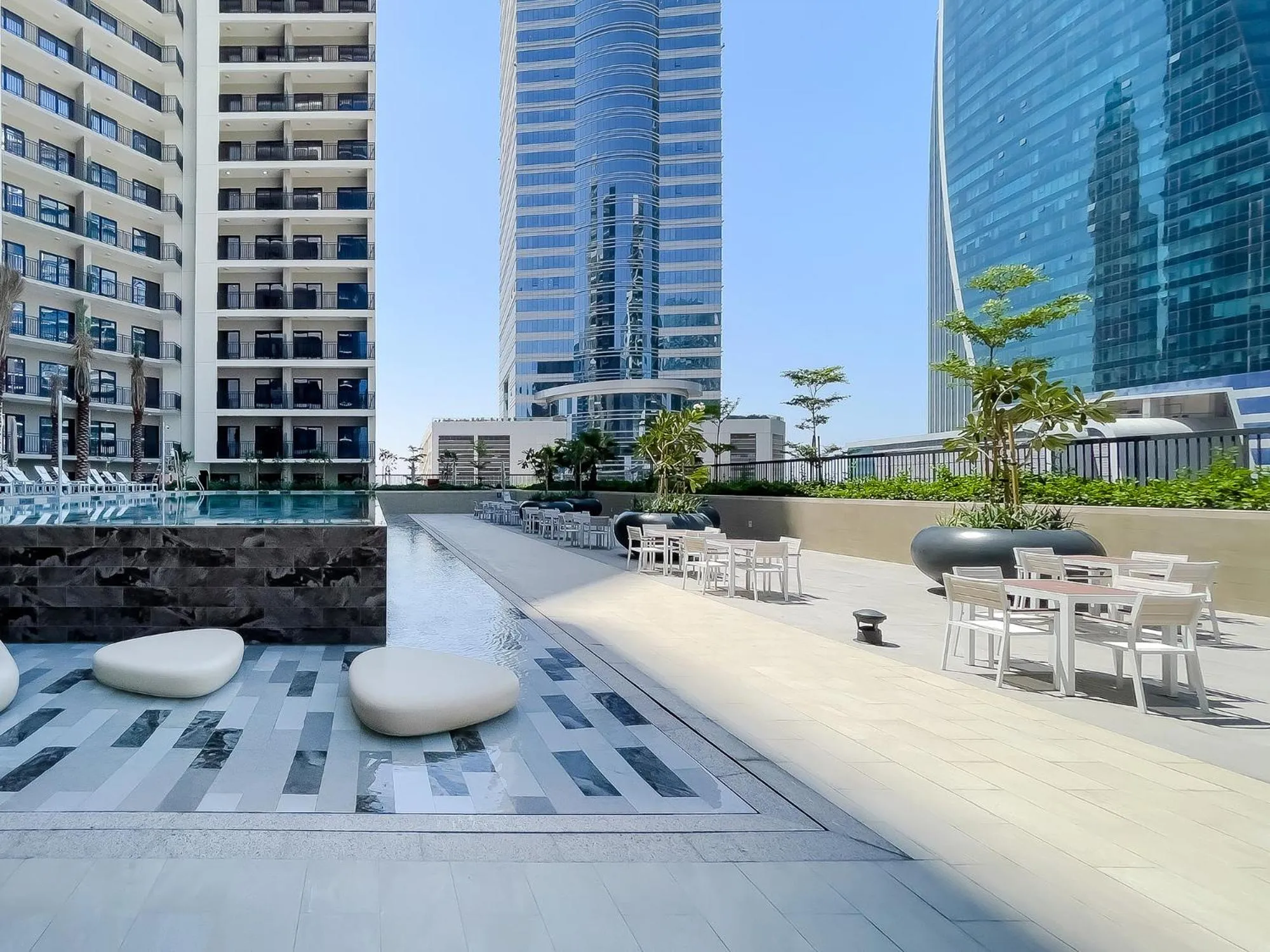 Swimming pool in Zada Tower 1BR with amazing Dubai Canal view