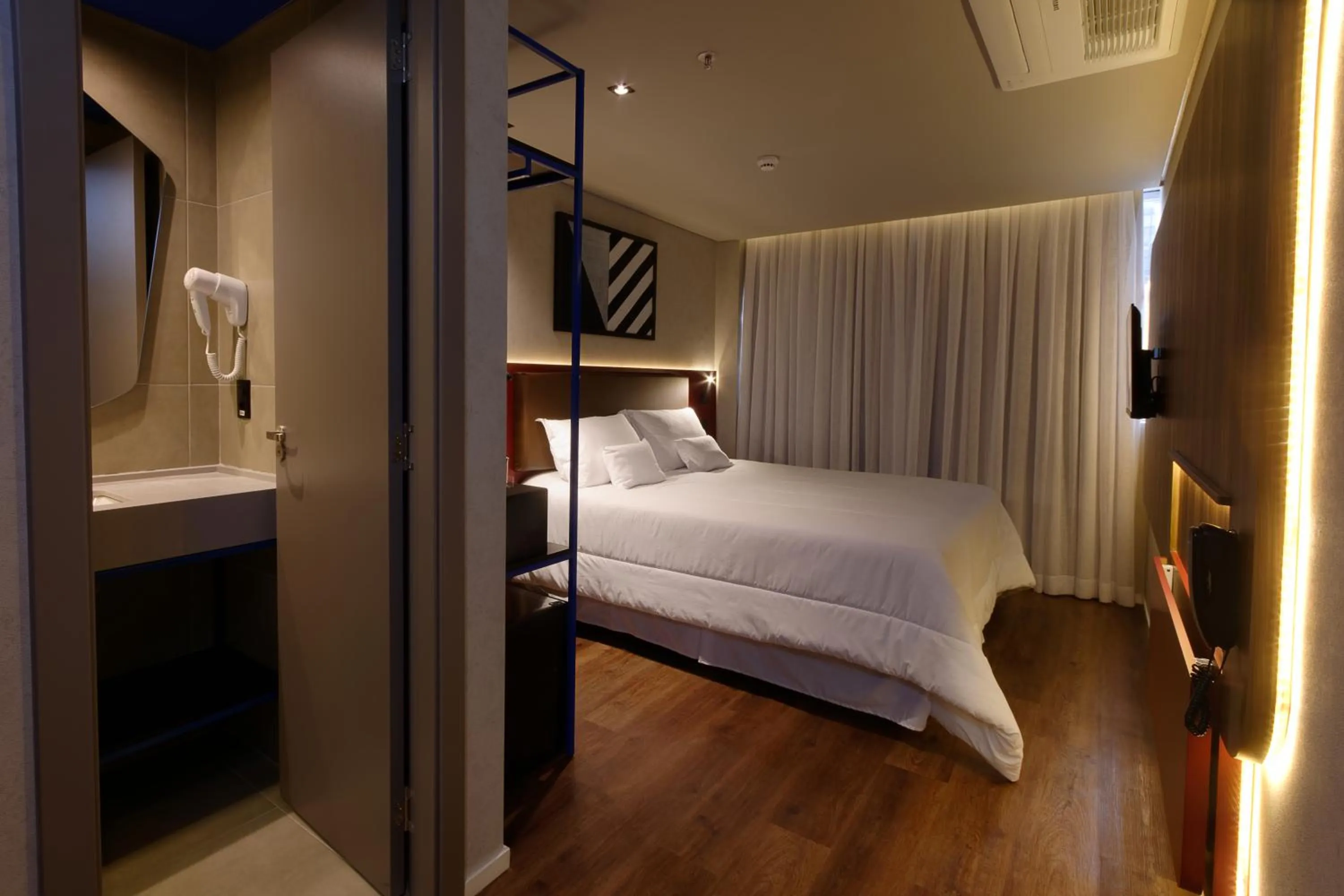 Bed in Golden Tower Express Nações Unidas by Fênix Hotéis