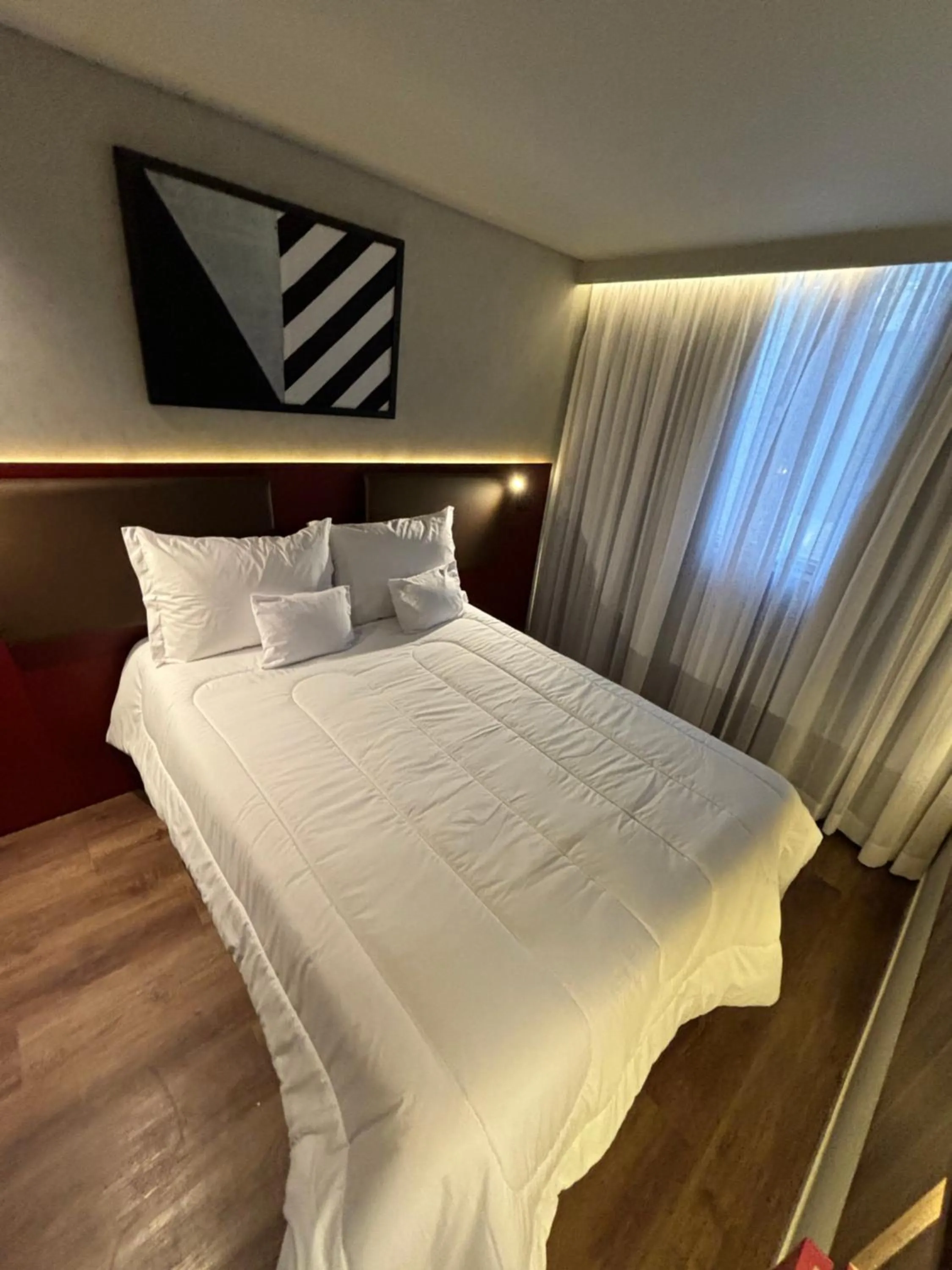 Bed in Golden Tower Express Nações Unidas by Fênix Hotéis