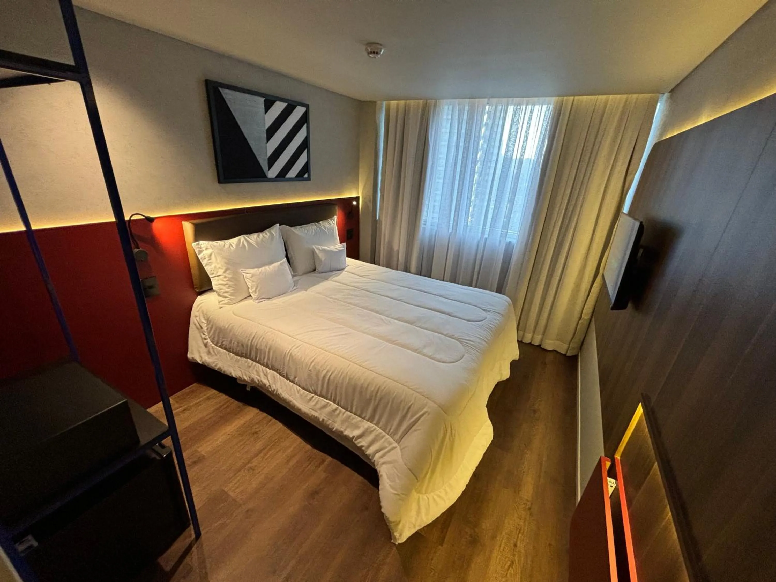 Bed in Golden Tower Express Nações Unidas by Fênix Hotéis