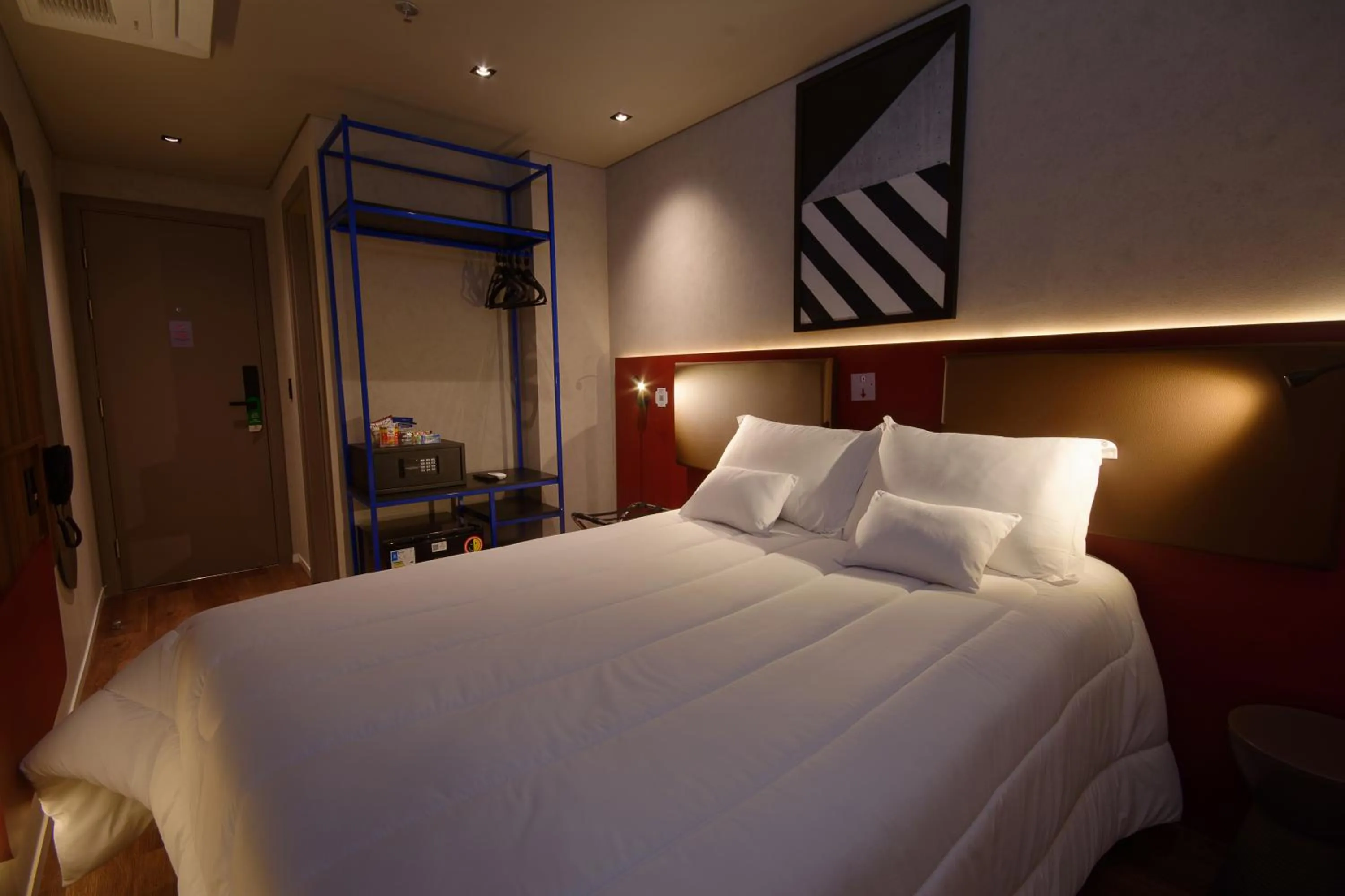 Bed in Golden Tower Express Nações Unidas by Fênix Hotéis