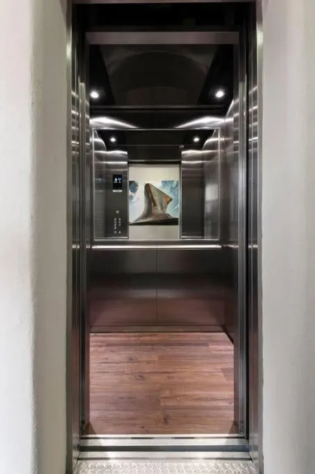 elevator in 301 Historic building 1Bdrm 1bath AC Rooftop