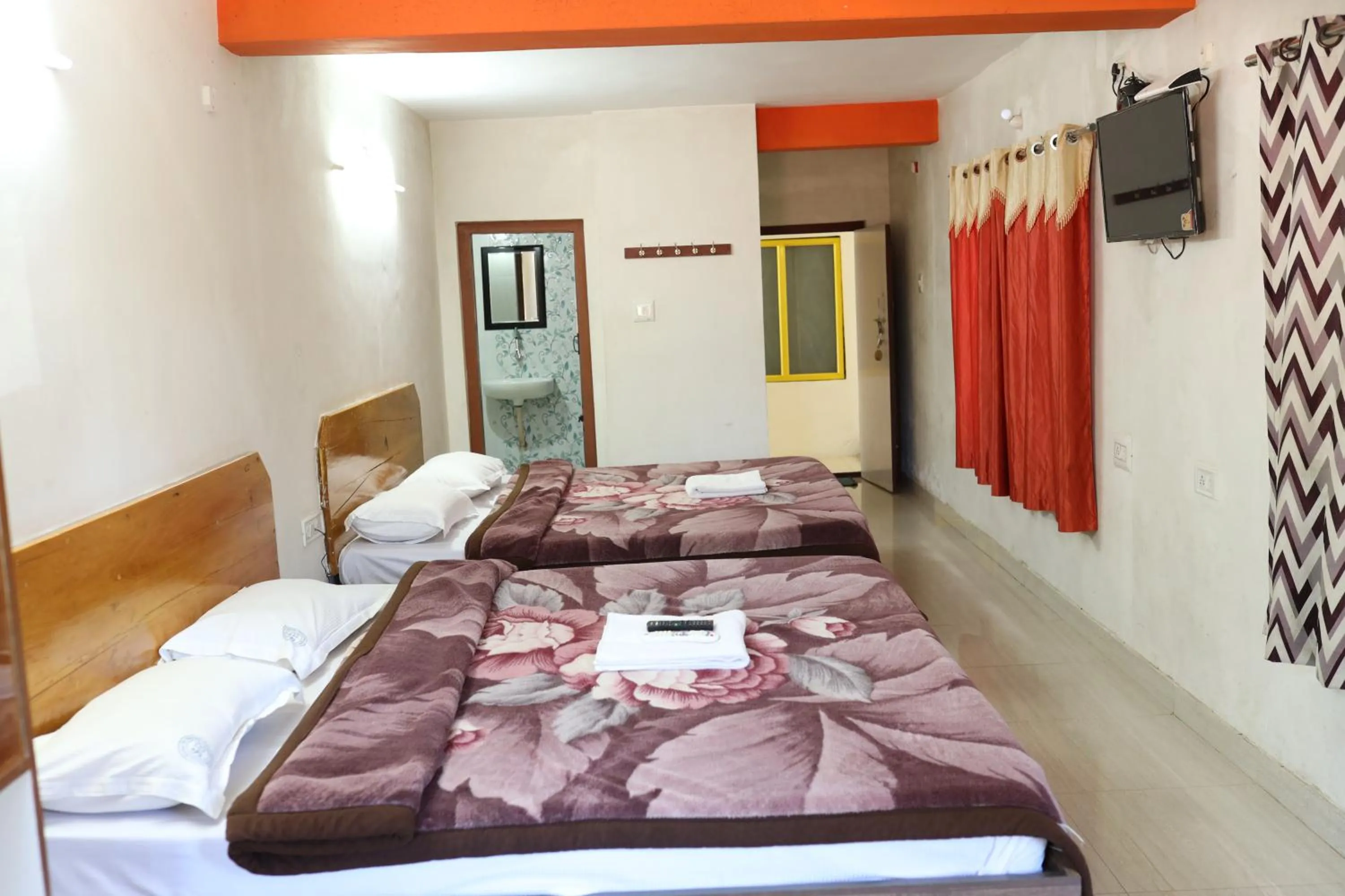 Photo of the whole room, Bed in Hotel Sri Balaji