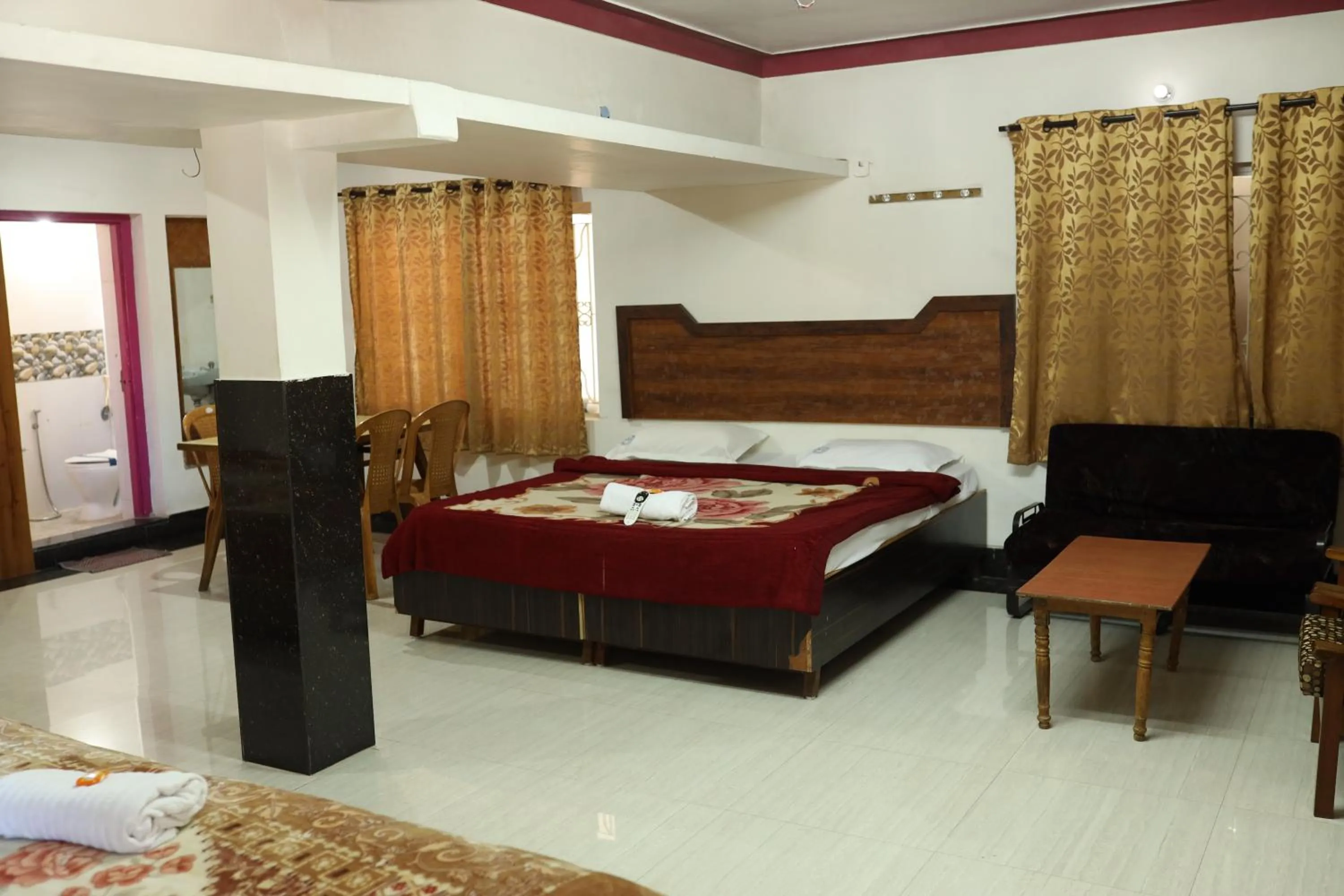 Photo of the whole room, Bed in Hotel Sri Balaji