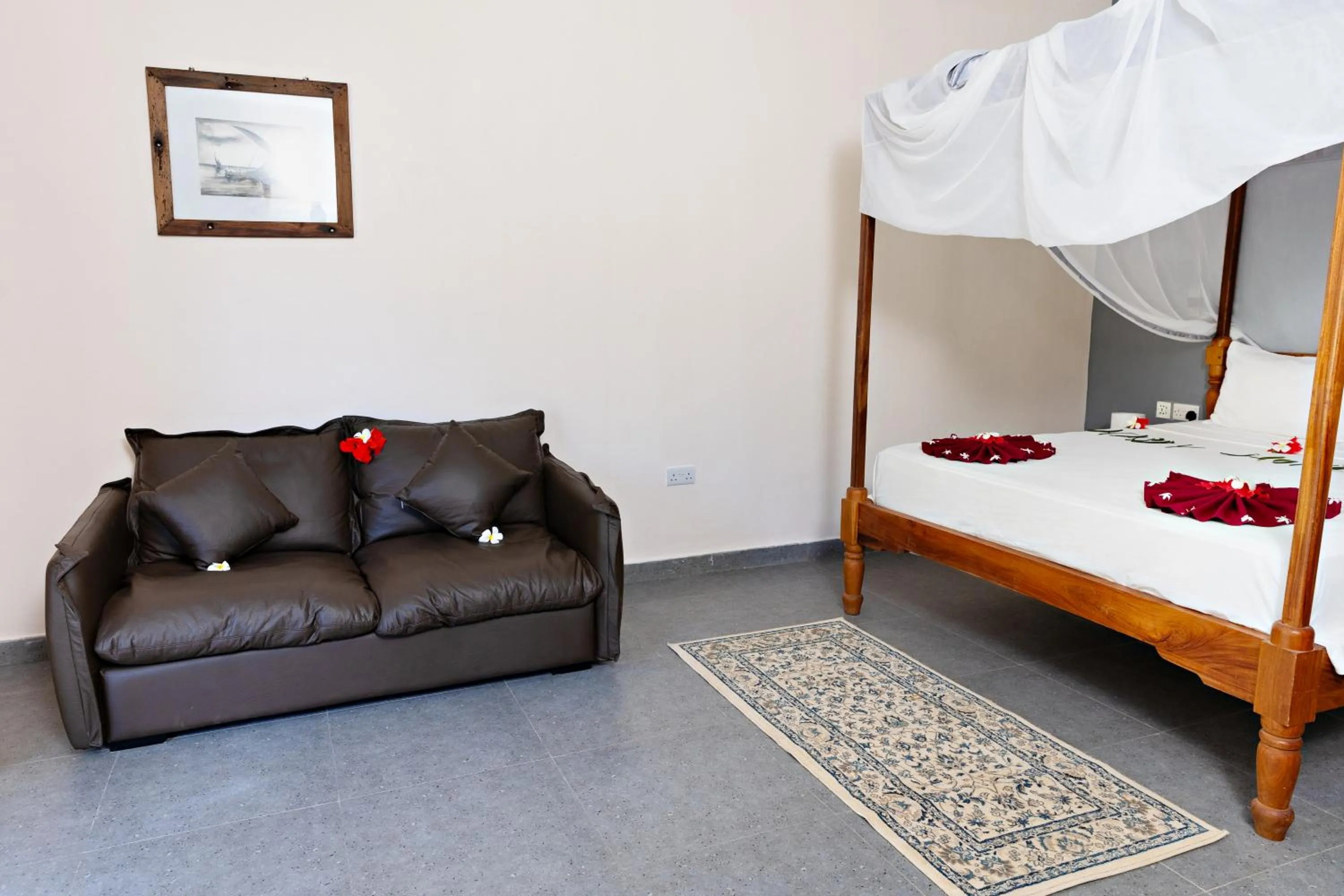 Seating area, Bed in Tanzanite Beach Resort