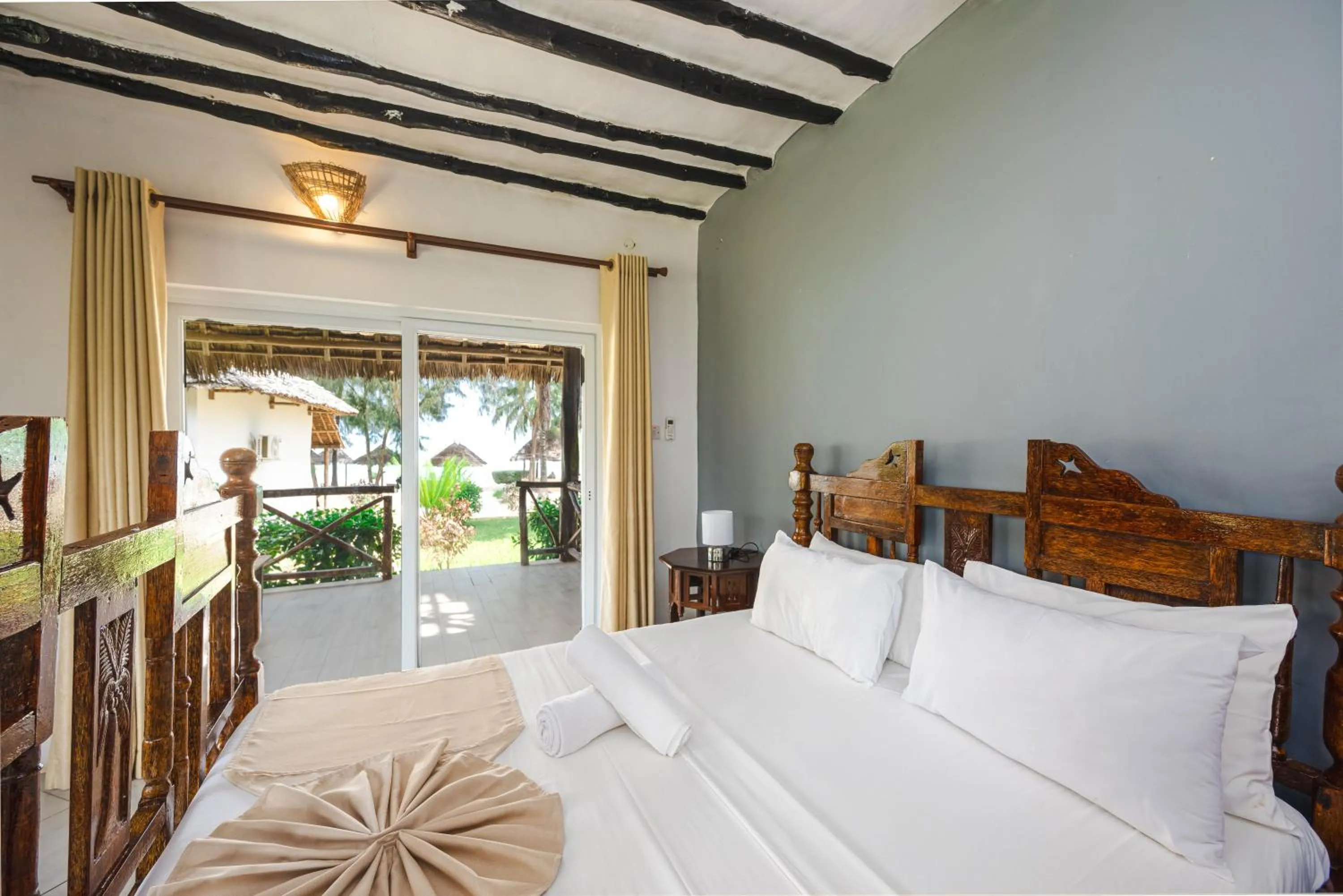 Bed in Tanzanite Beach Resort