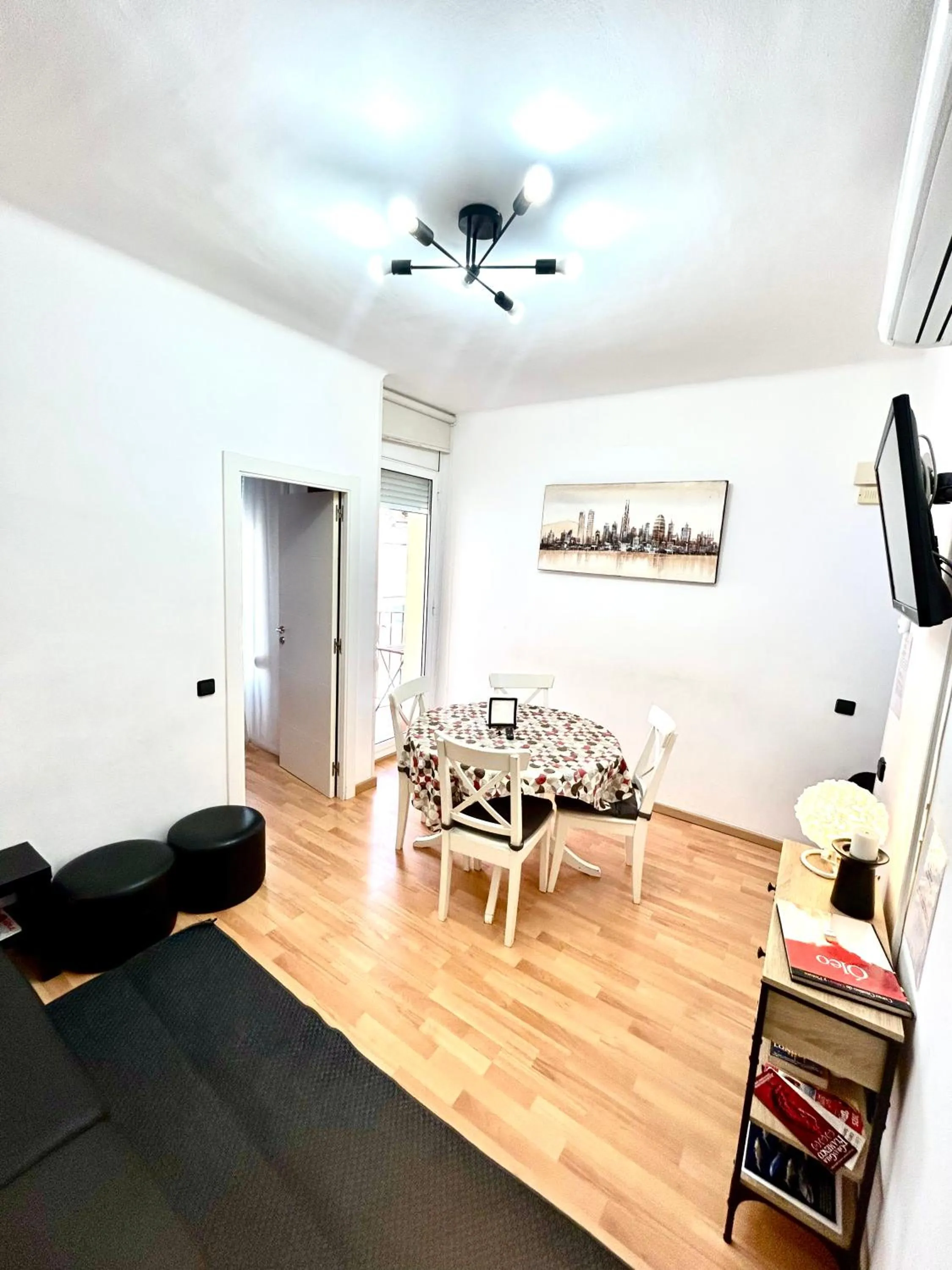 Communal lounge/ TV room in Apartment carrer d'Olesa