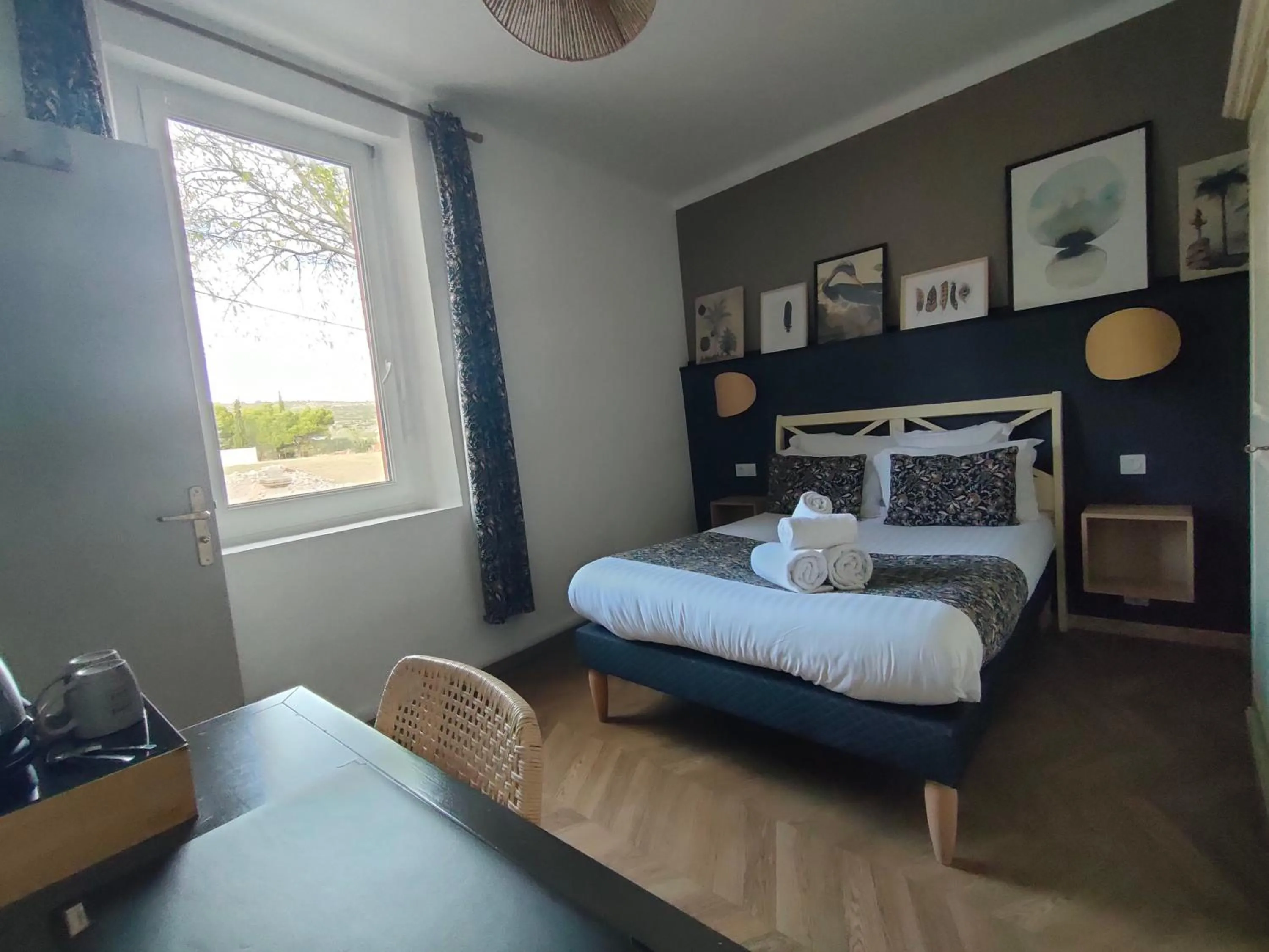 Bed in Hôtel Restaurant L'Art des Mets by Côté Jardin