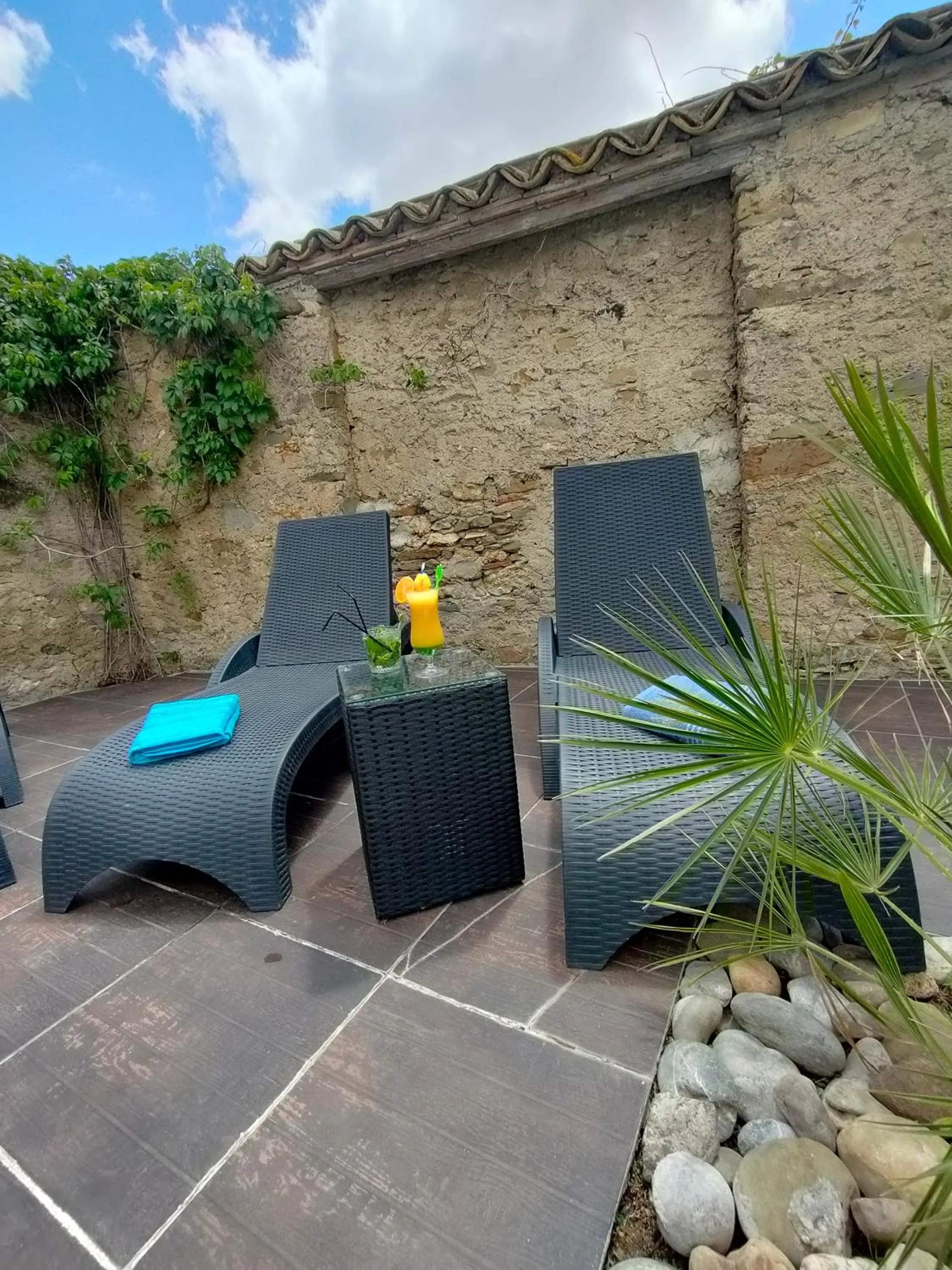 Patio in Hôtel Restaurant L'Art des Mets by Côté Jardin