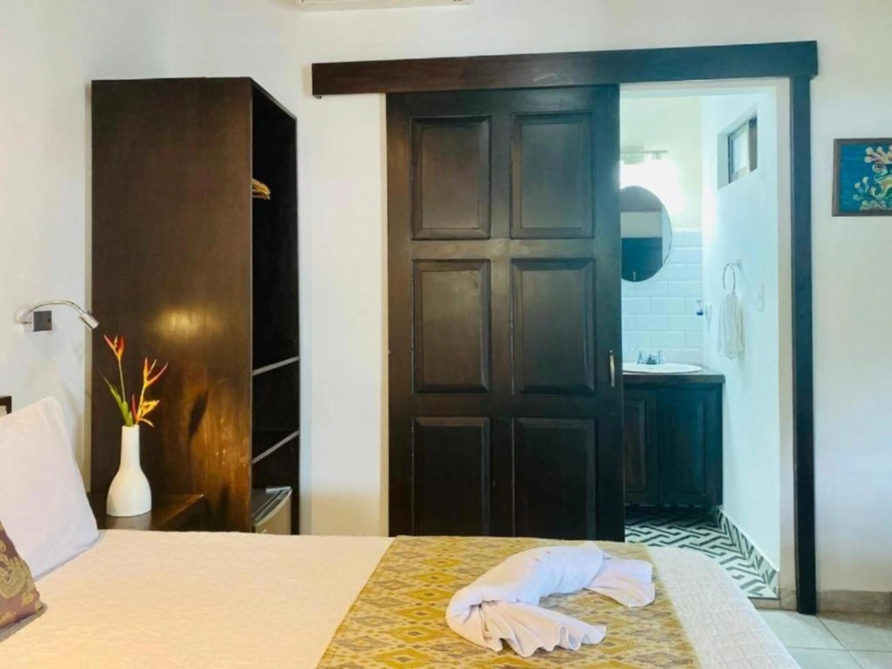 Bed in La Fortuna Lodge by Treebu Hotels