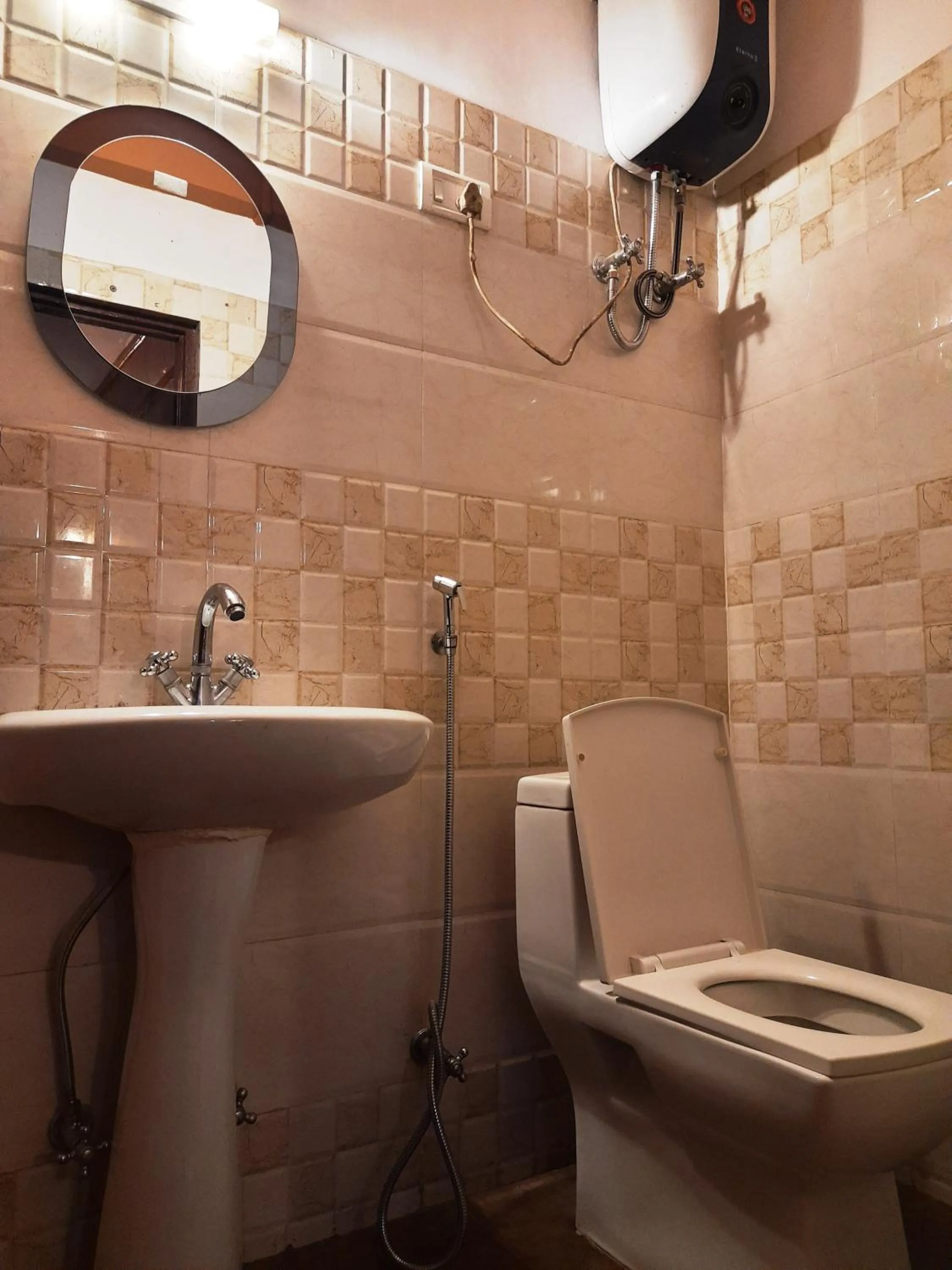 Toilet in Hotel Golden Orchid