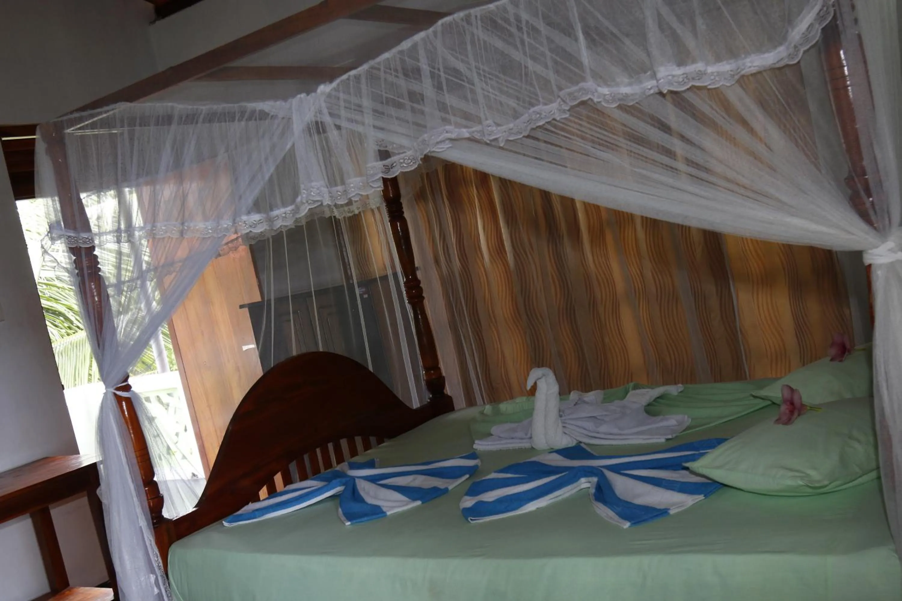 Bed in Beach Lagoon Guesthouse