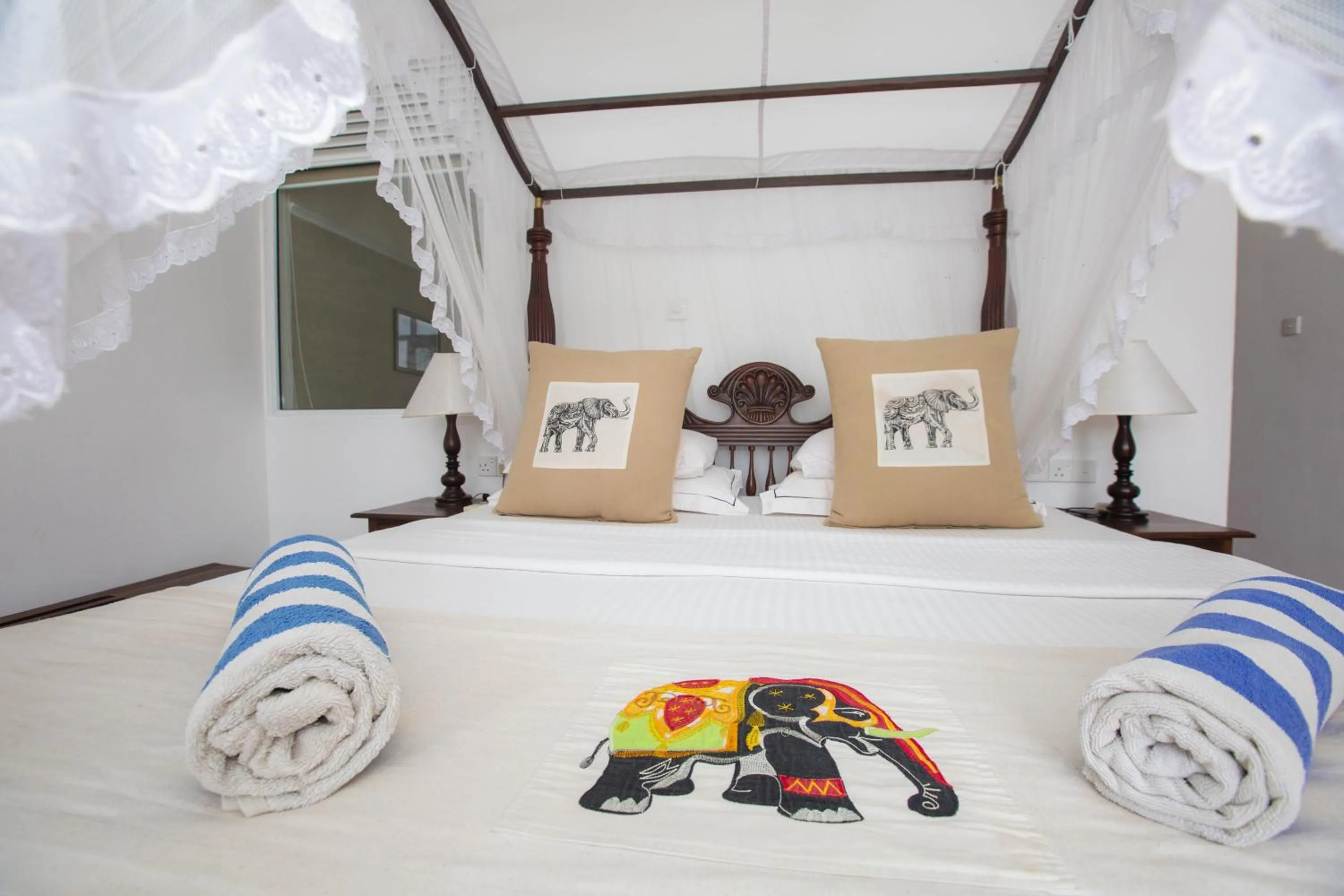 Bed in Sea World Boutique Hotel