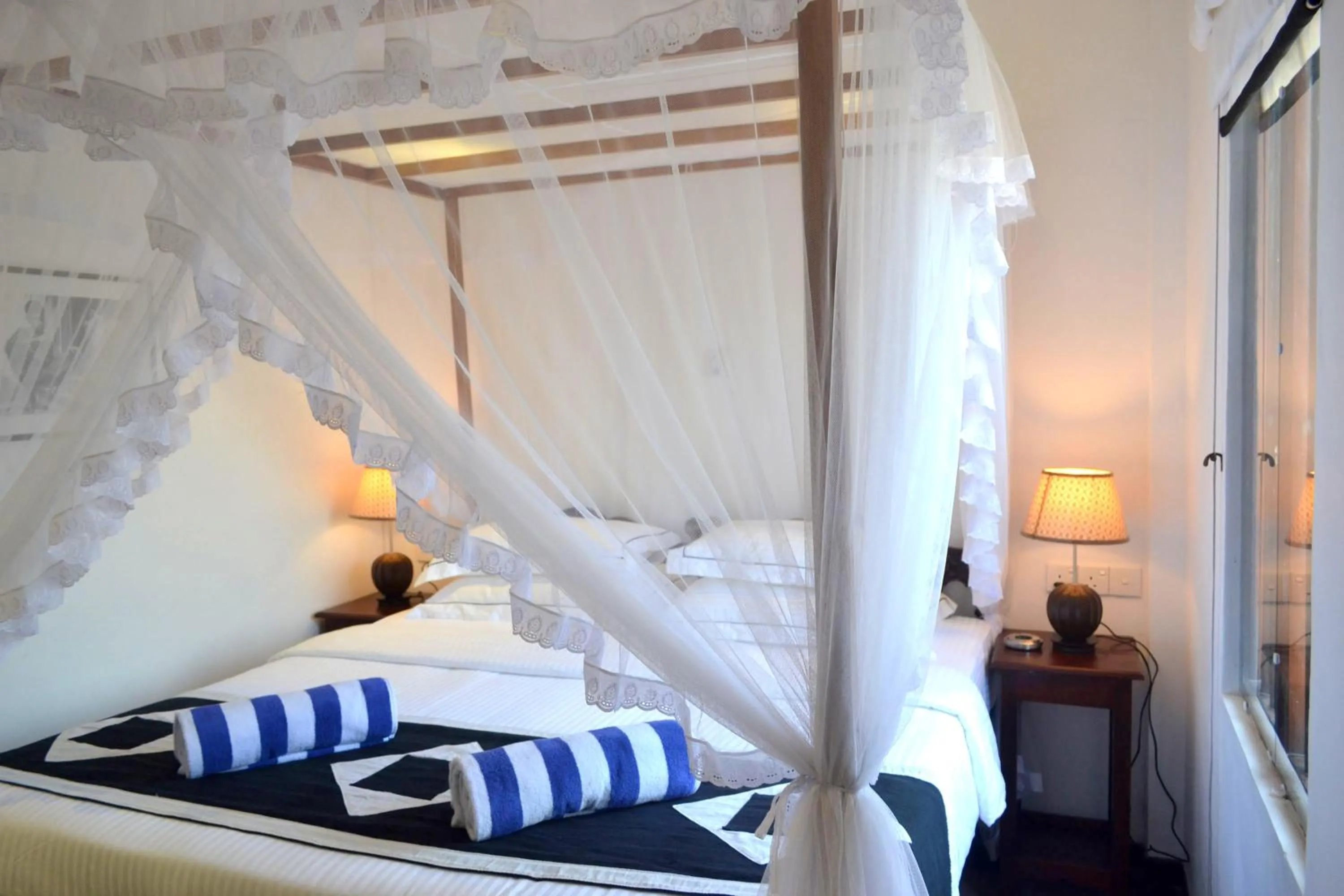 Bed in Sea World Boutique Hotel