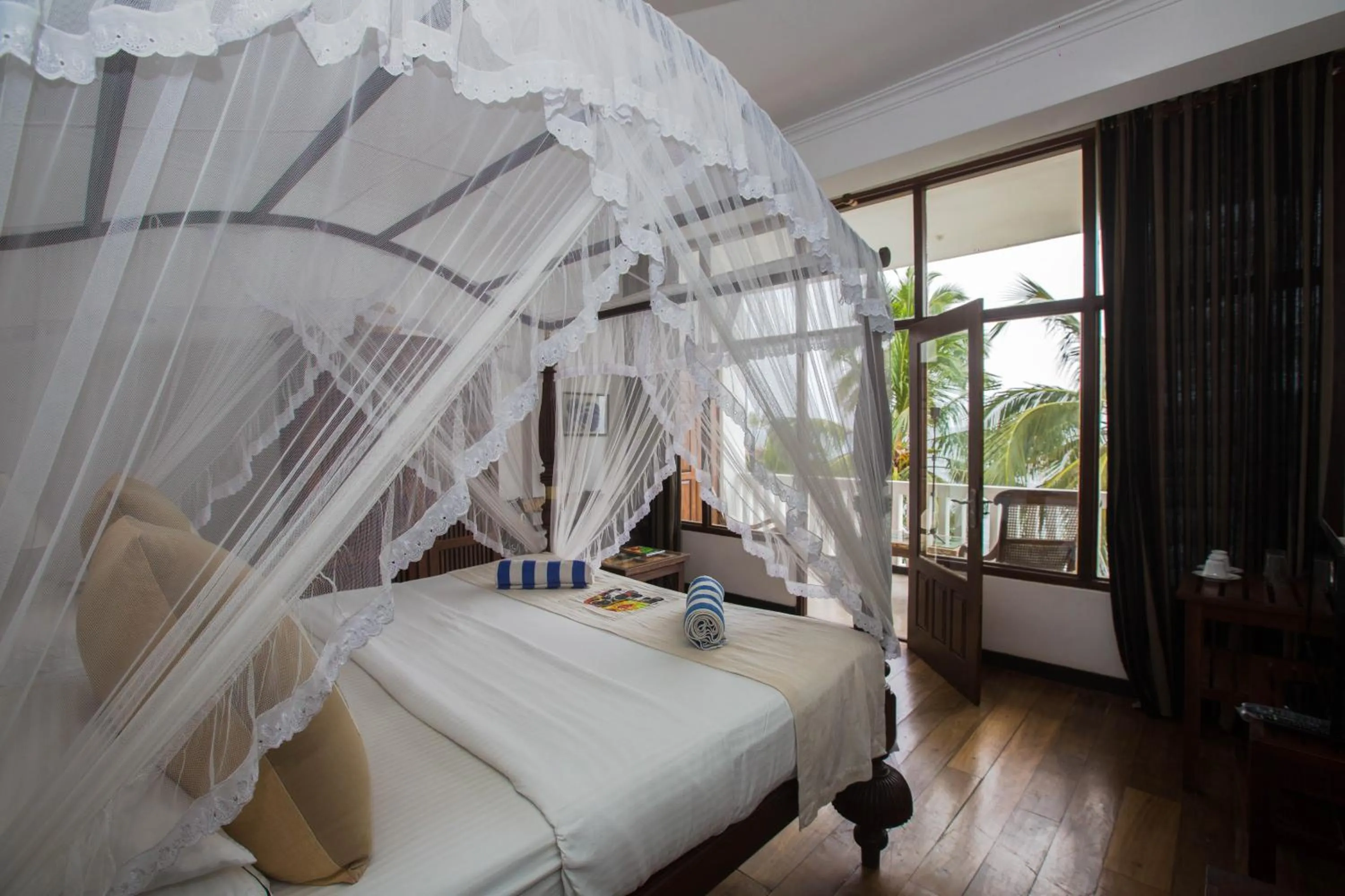 Bed in Sea World Boutique Hotel