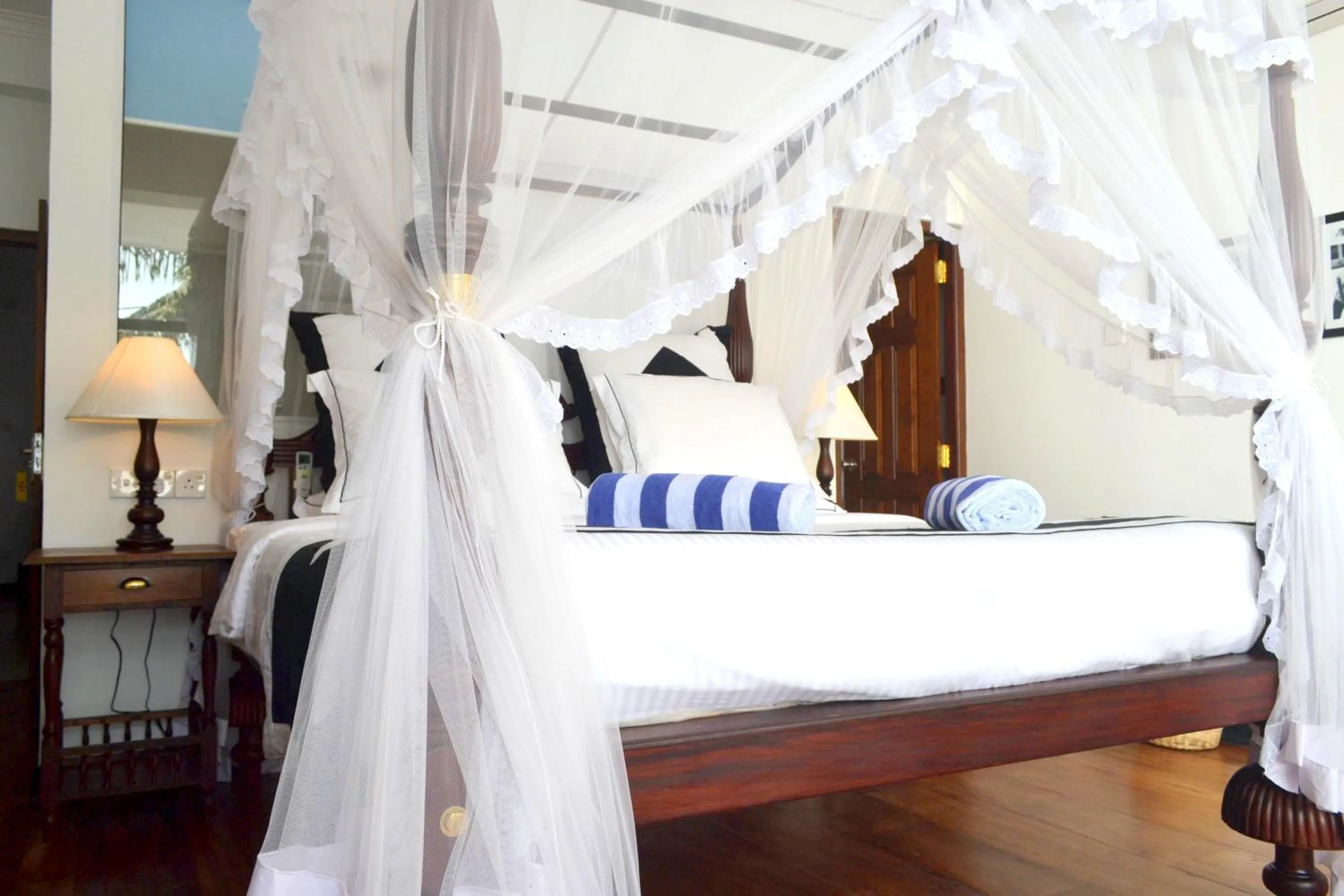 Bed in Sea World Boutique Hotel