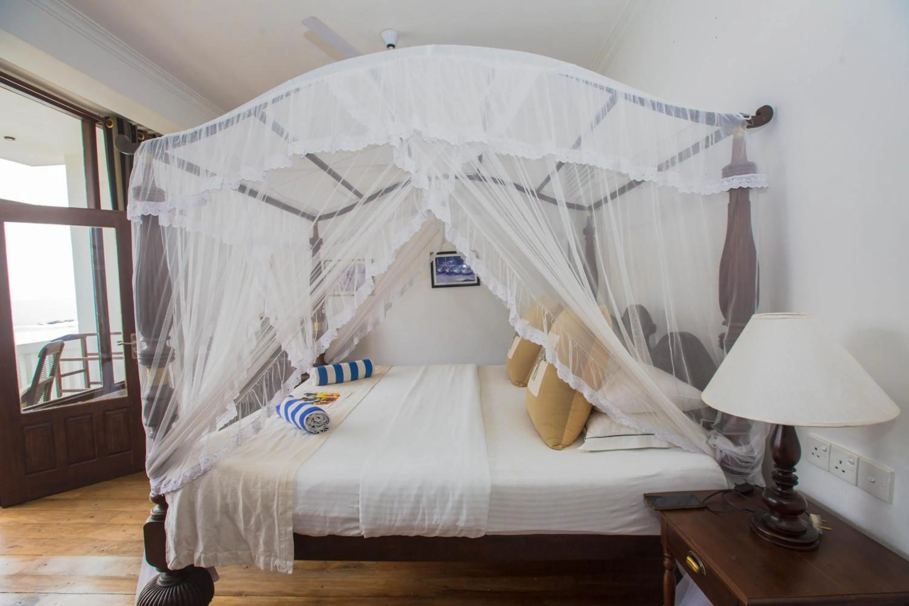 Photo of the whole room, Bed in Sea World Boutique Hotel