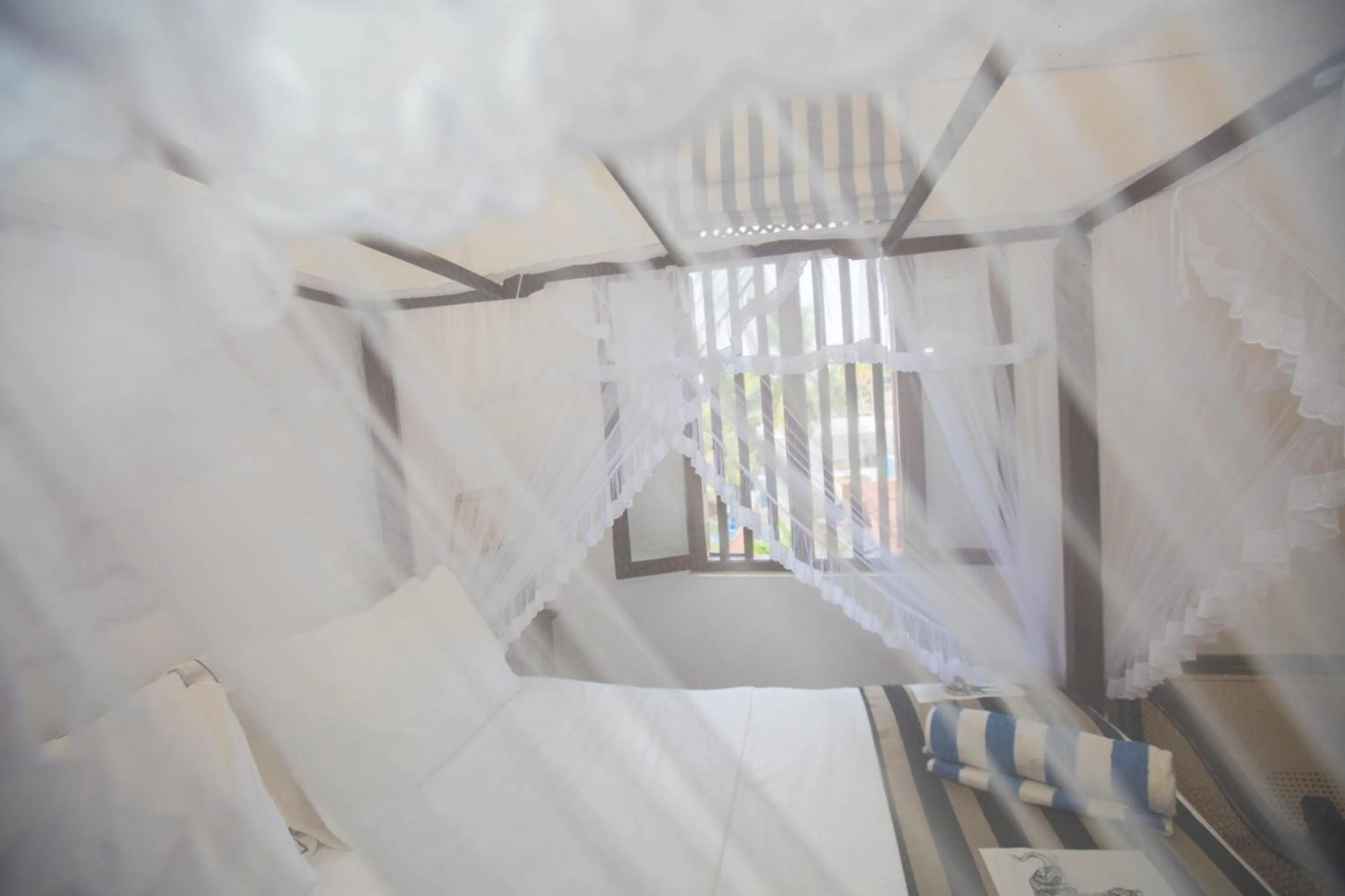 Bedroom in Sea World Boutique Hotel