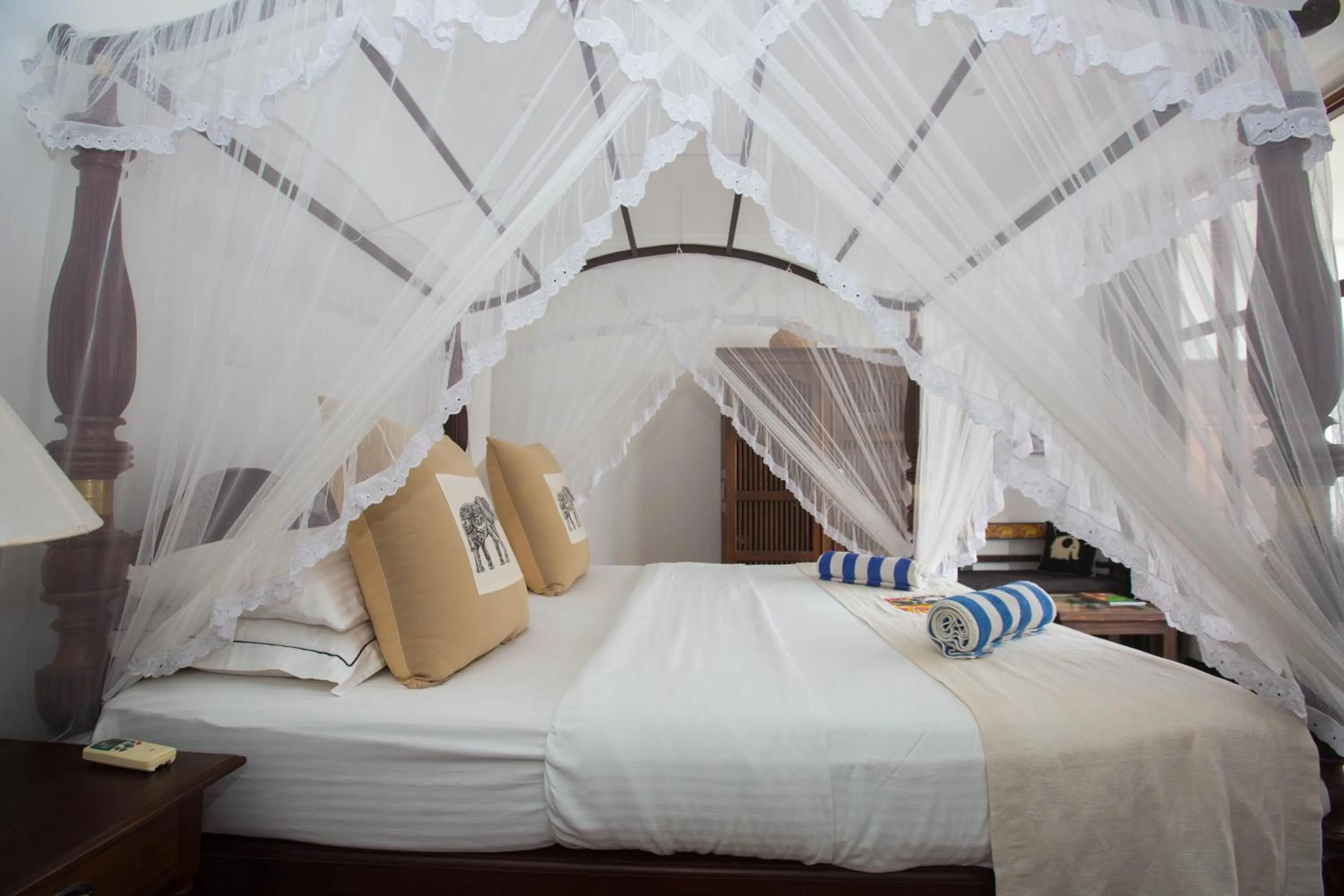 Bed in Sea World Boutique Hotel