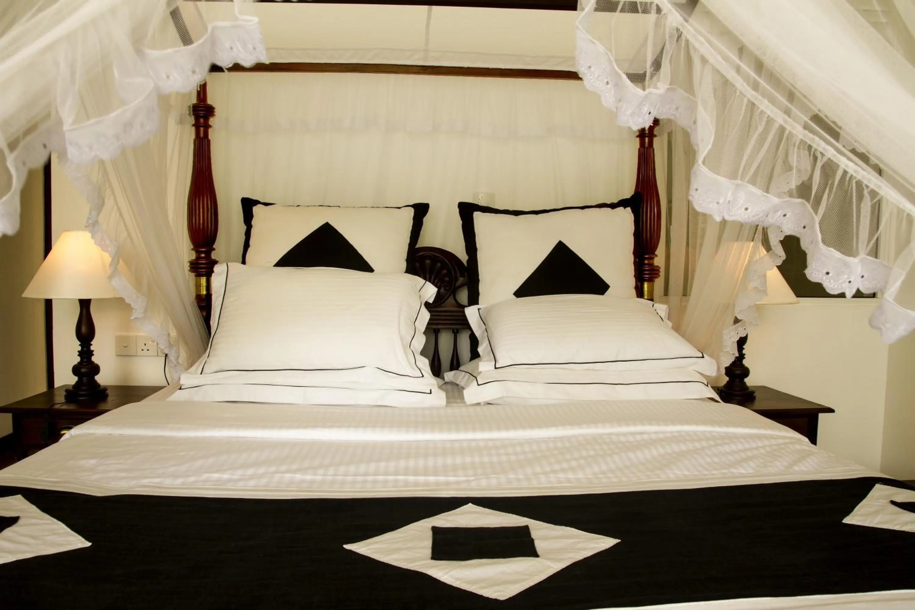 Bed in Sea World Boutique Hotel