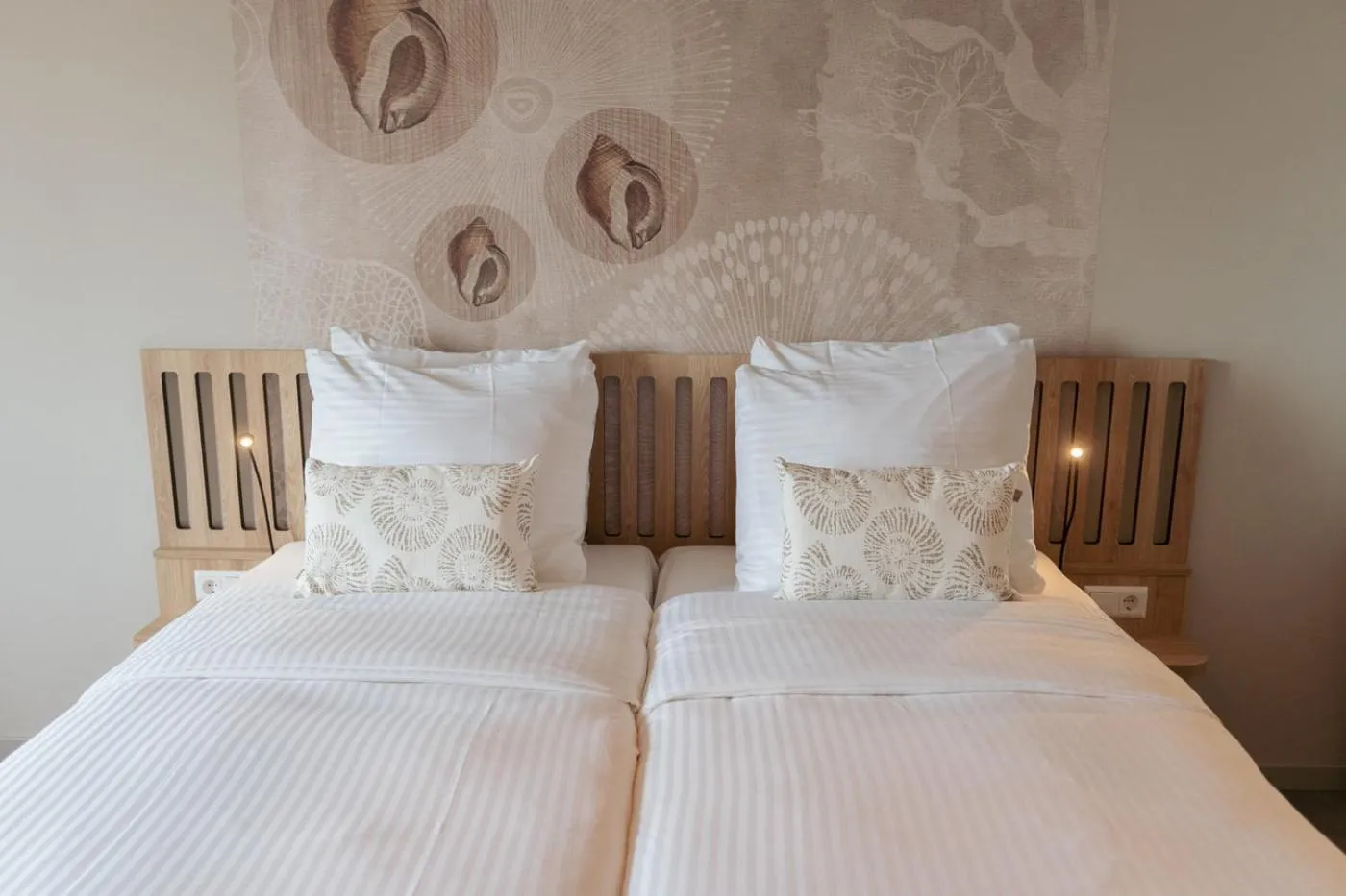 Bed in Beachfront Boutiquehotel