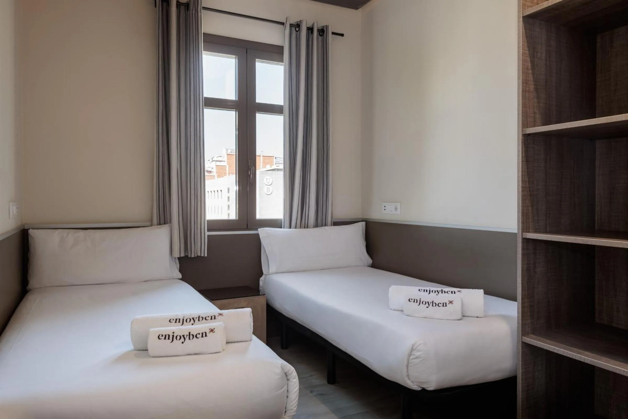 Bed in Enjoybcn Miro Apartments