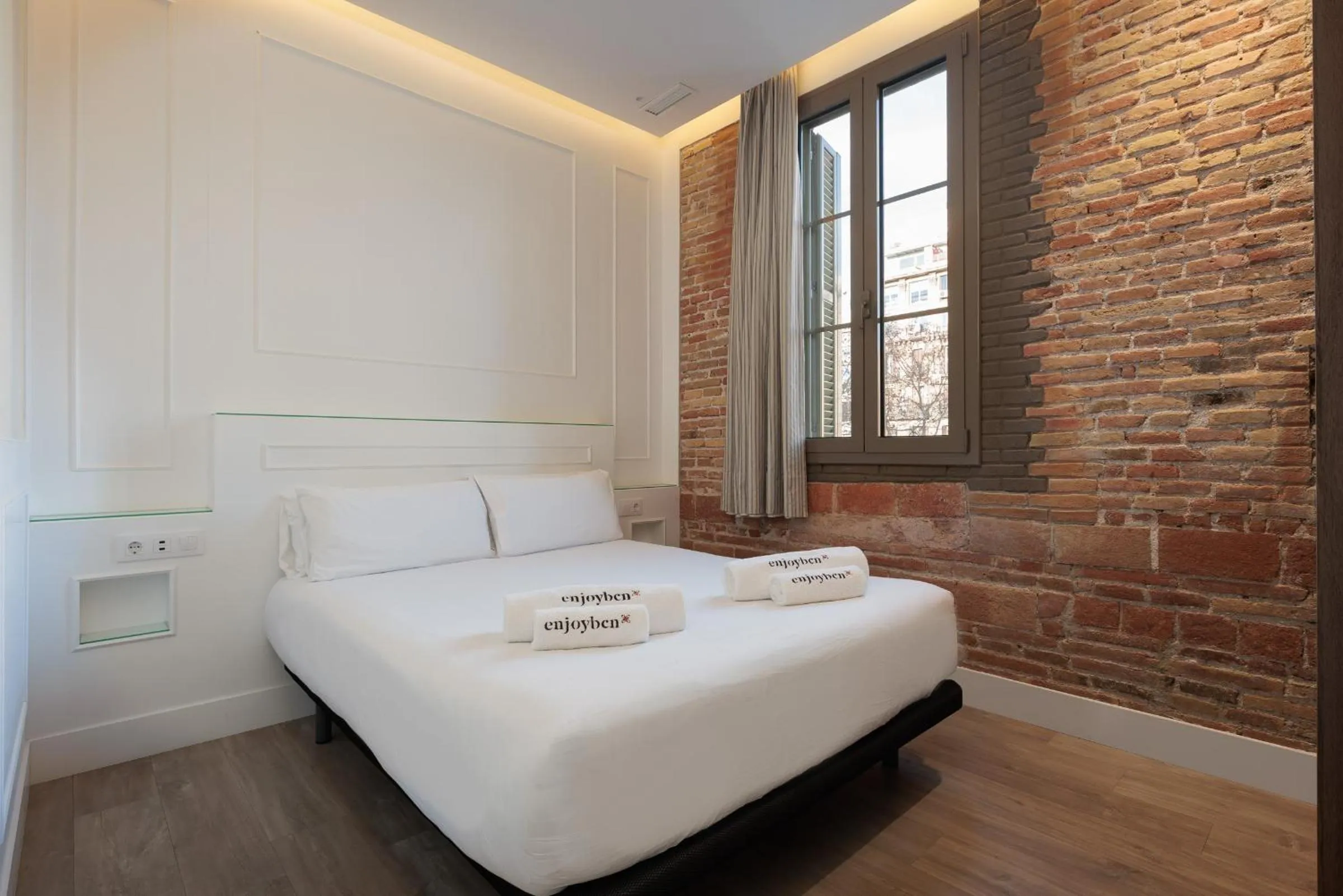 Bed in Enjoybcn Miro Apartments