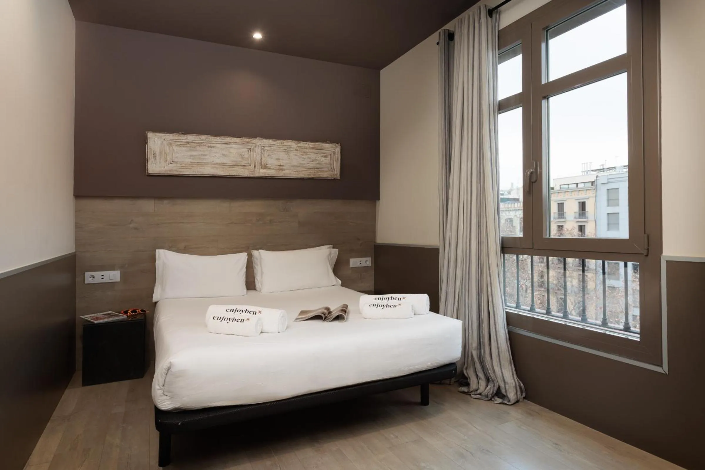 Bed in Enjoybcn Miro Apartments