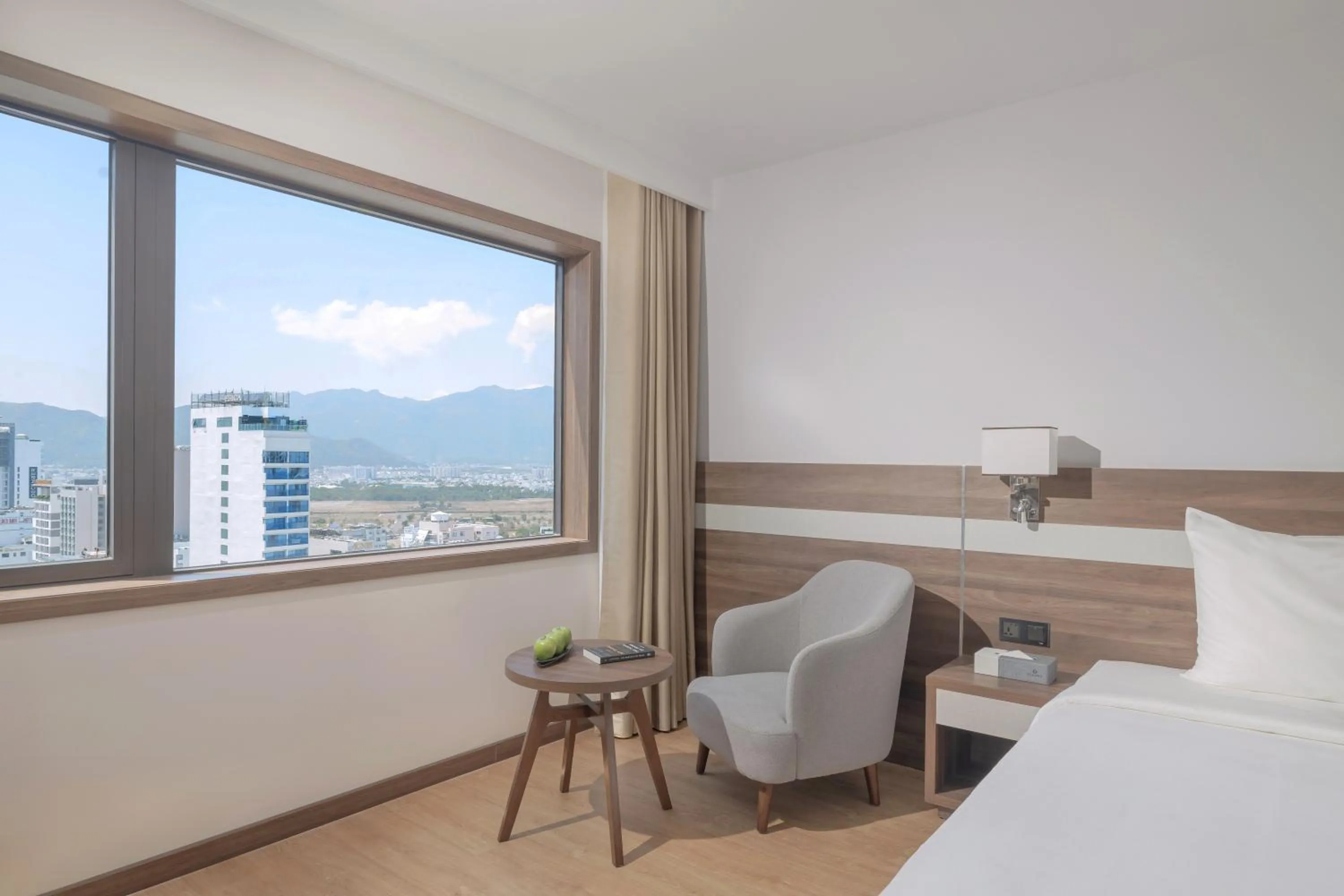 Living room, Bed in PANAMA Nha Trang Hotel