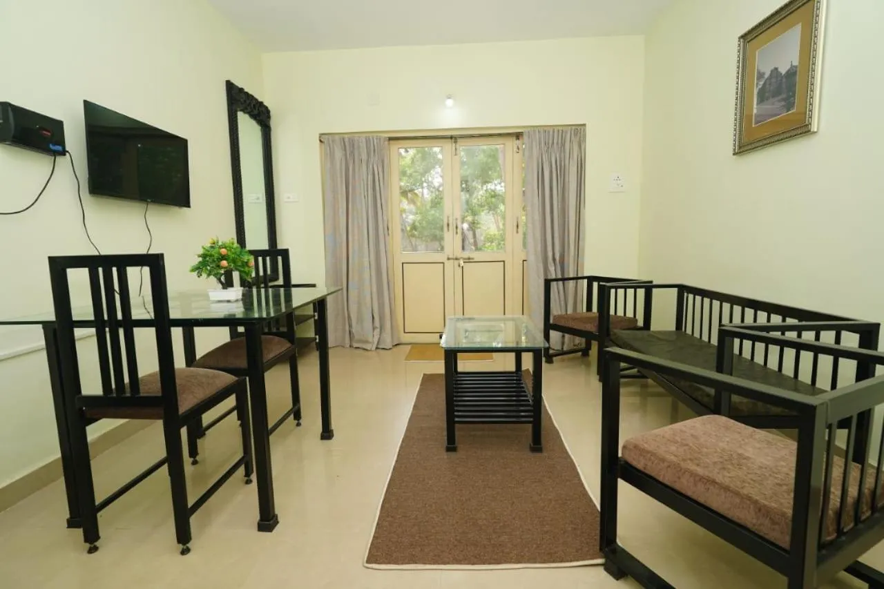Seating area, Bed in Four Seasons Guesthouse