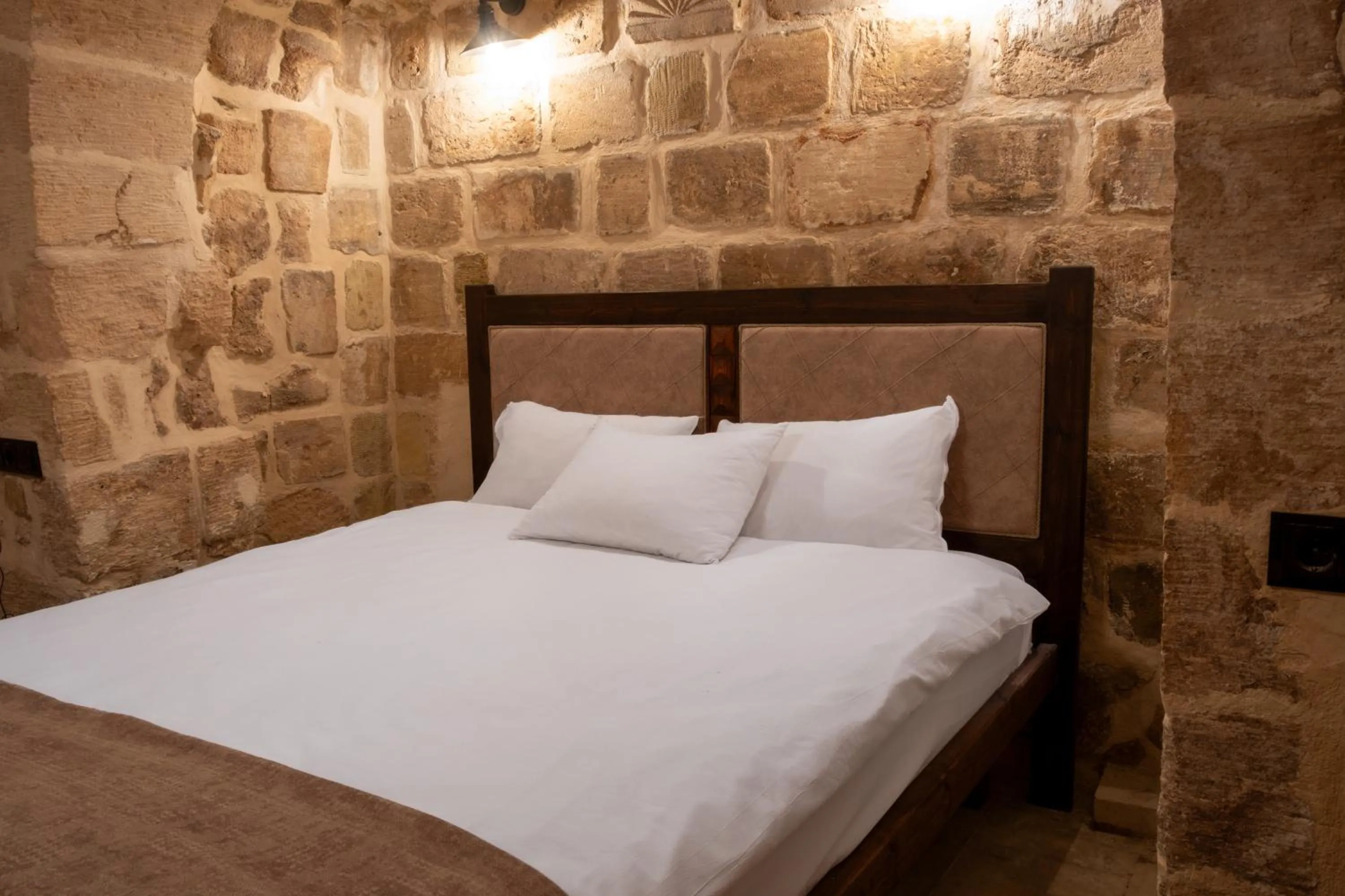 Bed in Marvel Hotel Mardin